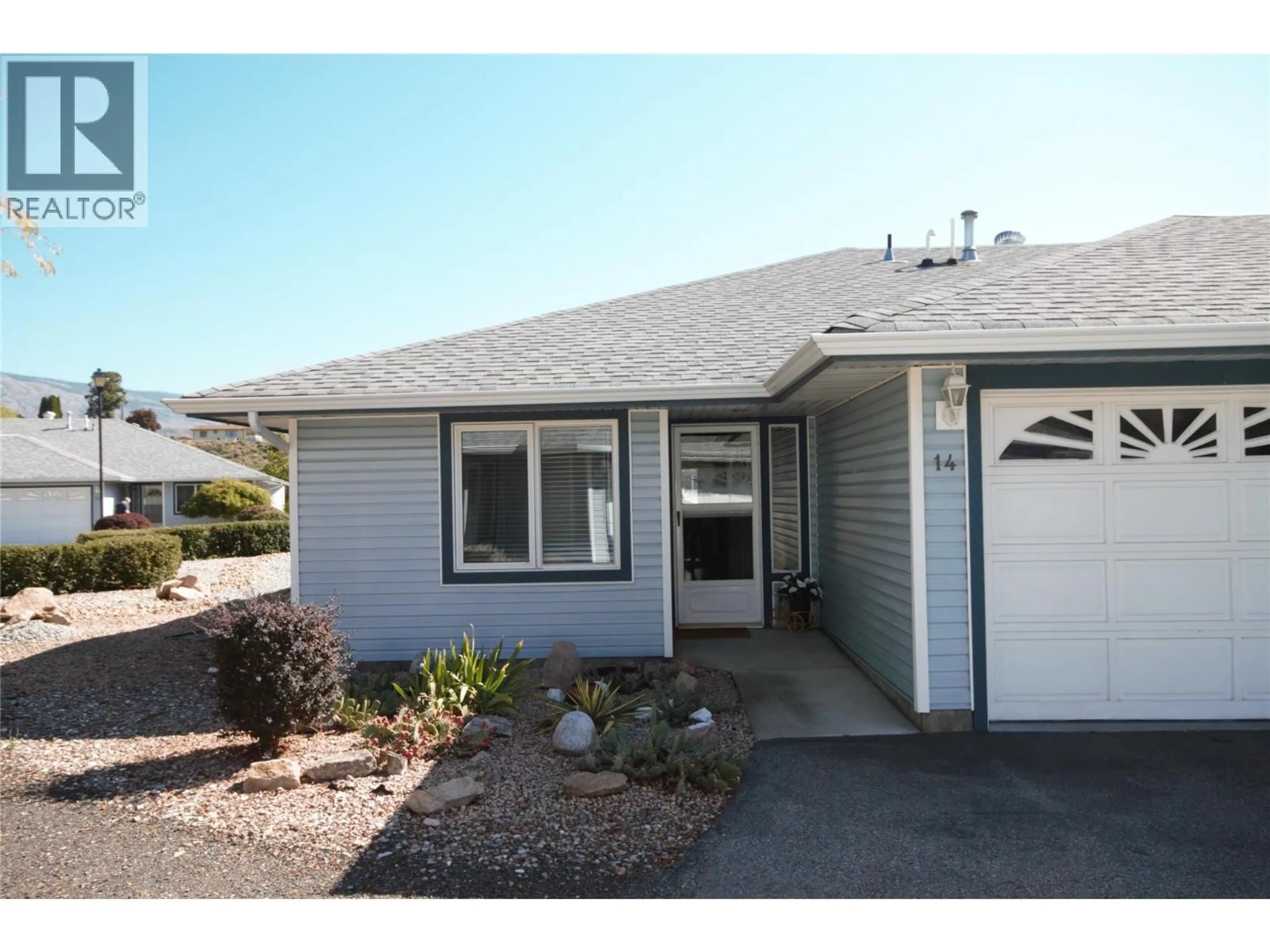 Home with vinyl exterior material, street for 14 - 6446 MEADOWS DRIVE, Oliver British Columbia V0H1T3