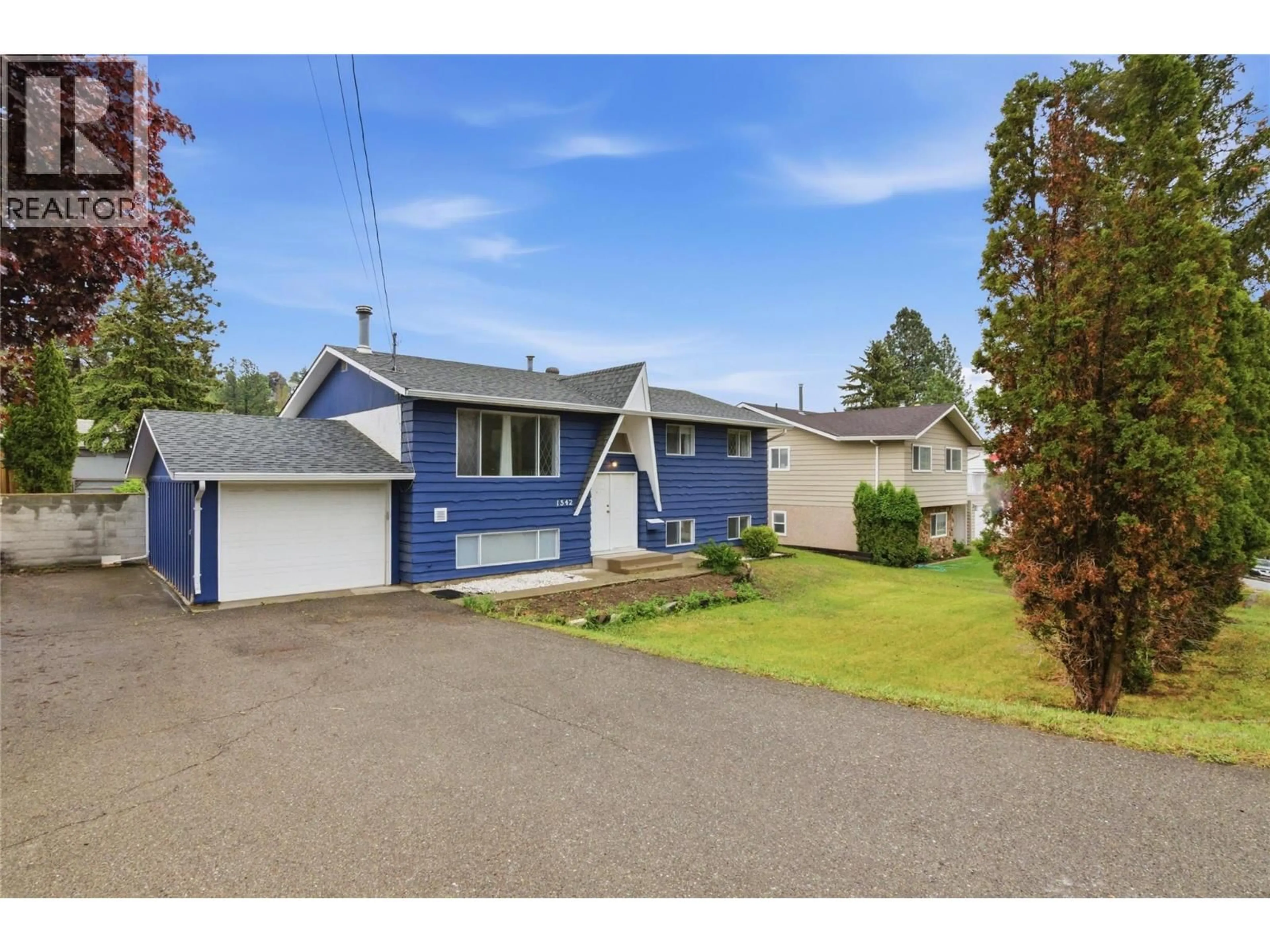 Home with vinyl exterior material, street for 1542 MT DUFFERIN CRESCENT, Kamloops British Columbia V2E1C2