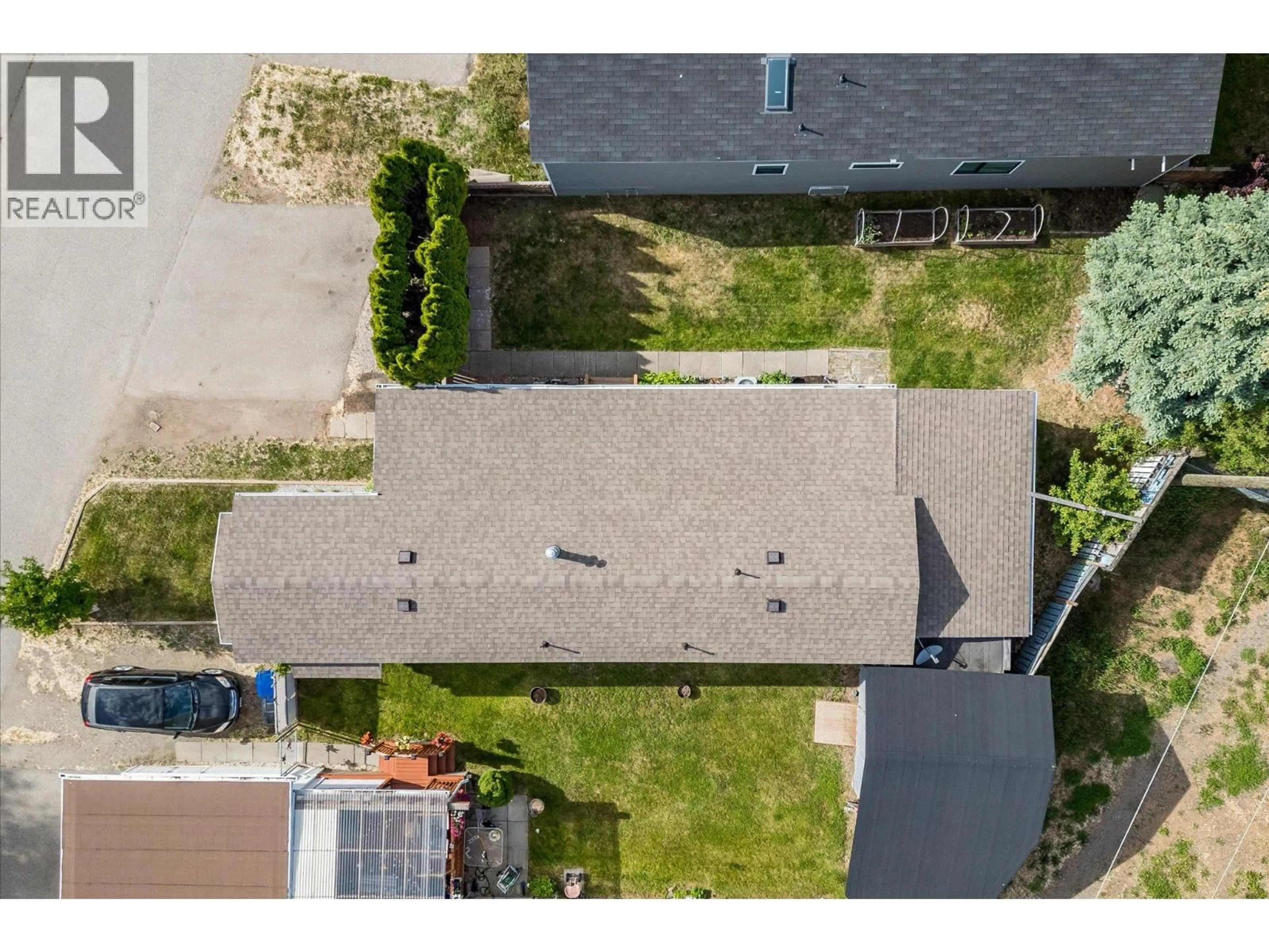 A pic from outside/outdoor area/front of a property/back of a property/a pic from drone, street for 95 - 2035 BOUCHERIE ROAD, West Kelowna British Columbia V4T1Z8