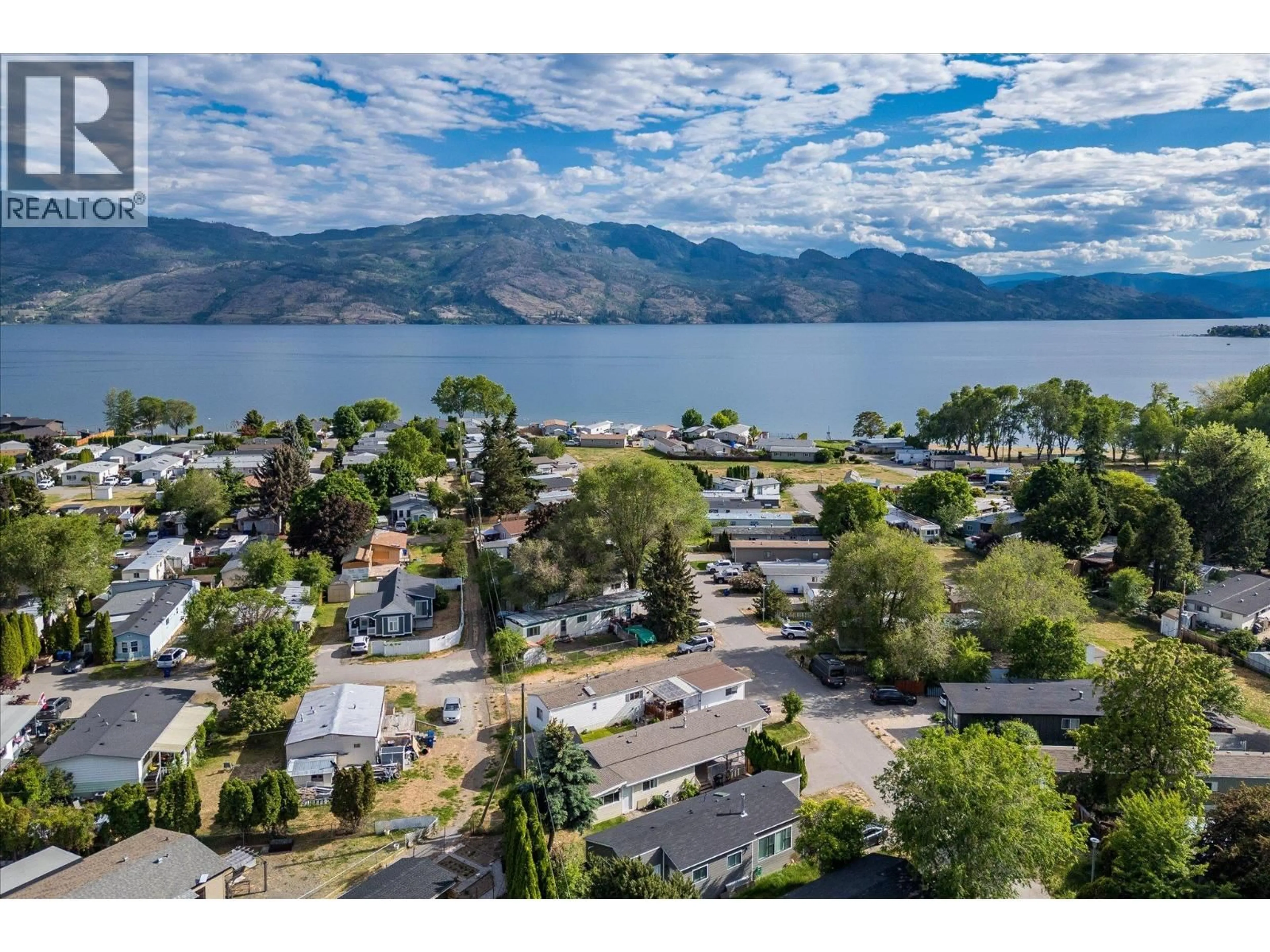 A pic from outside/outdoor area/front of a property/back of a property/a pic from drone, water/lake/river/ocean view for 95 - 2035 BOUCHERIE ROAD, West Kelowna British Columbia V4T1Z8