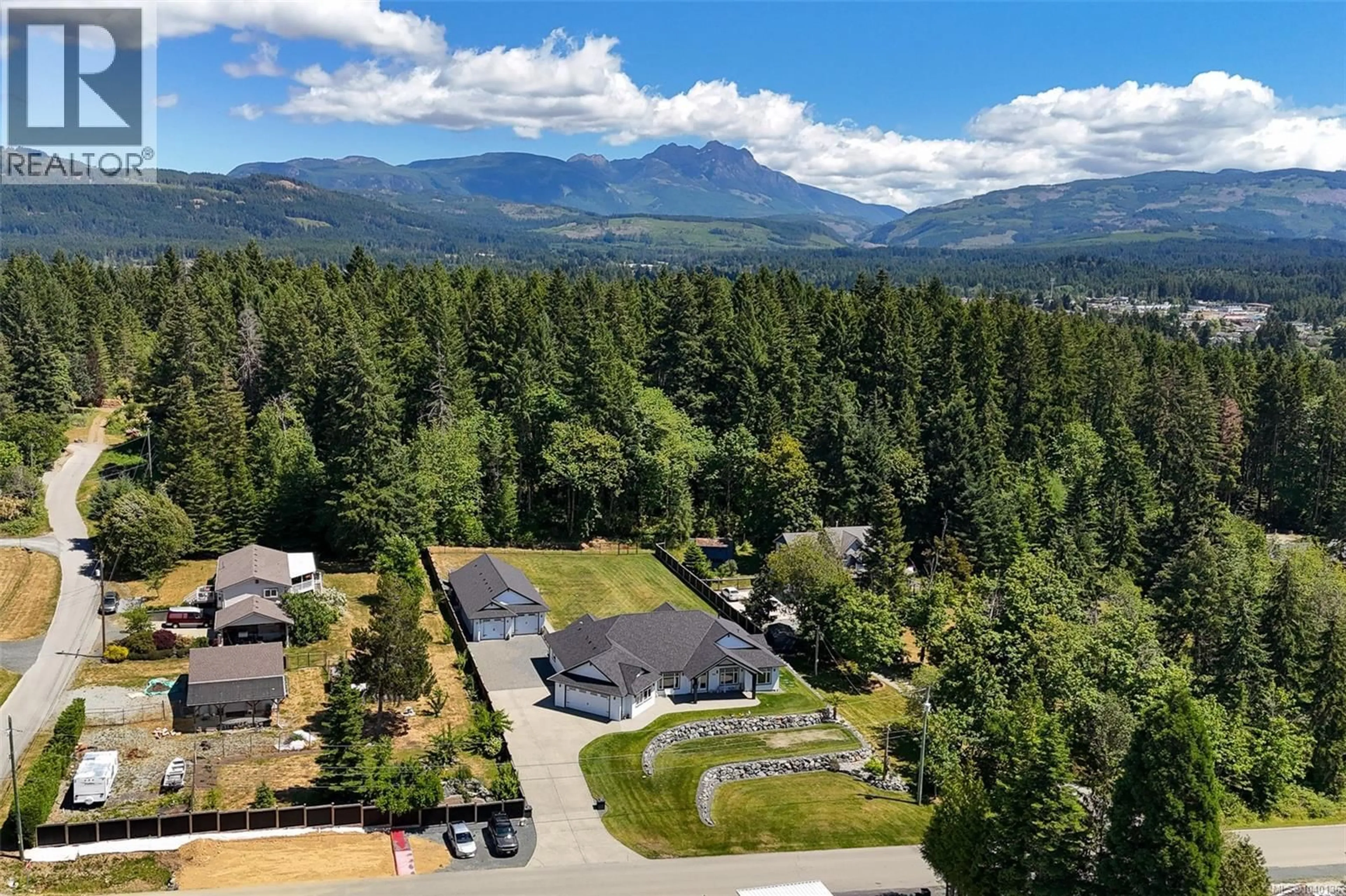 A pic from outside/outdoor area/front of a property/back of a property/a pic from drone, mountain view for 5623 ARVAY ROAD, Port Alberni British Columbia V9Y8H4