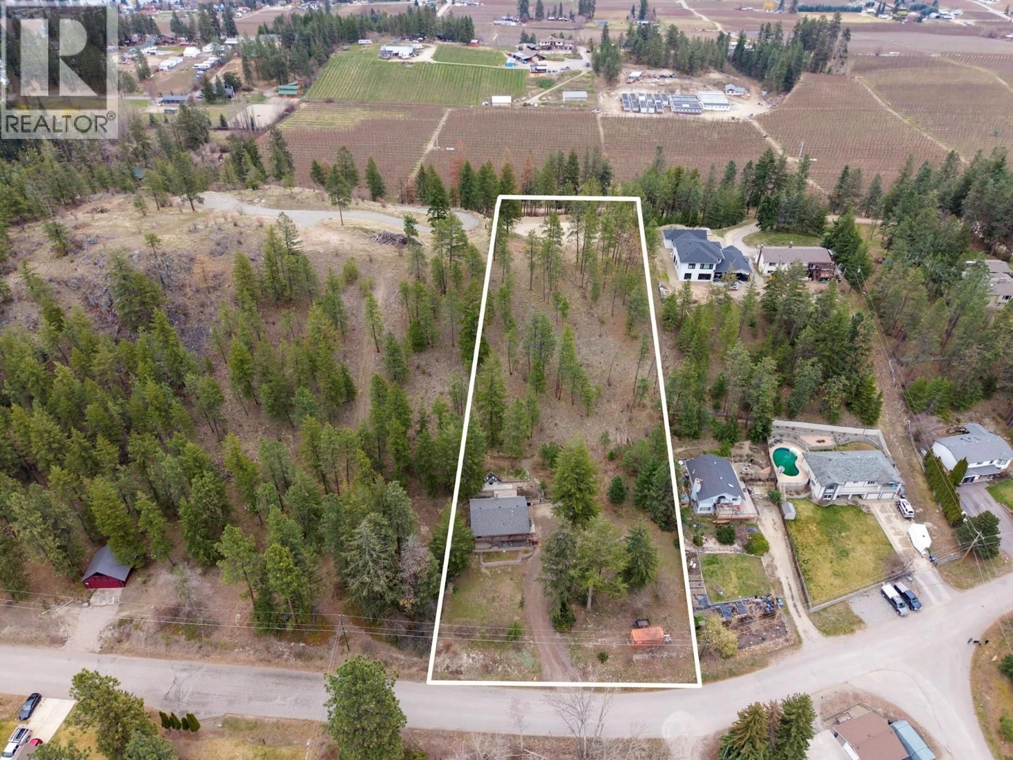 A pic from outside/outdoor area/front of a property/back of a property/a pic from drone, unknown for 11011 HALLAM DRIVE, Lake Country British Columbia V4V1P2