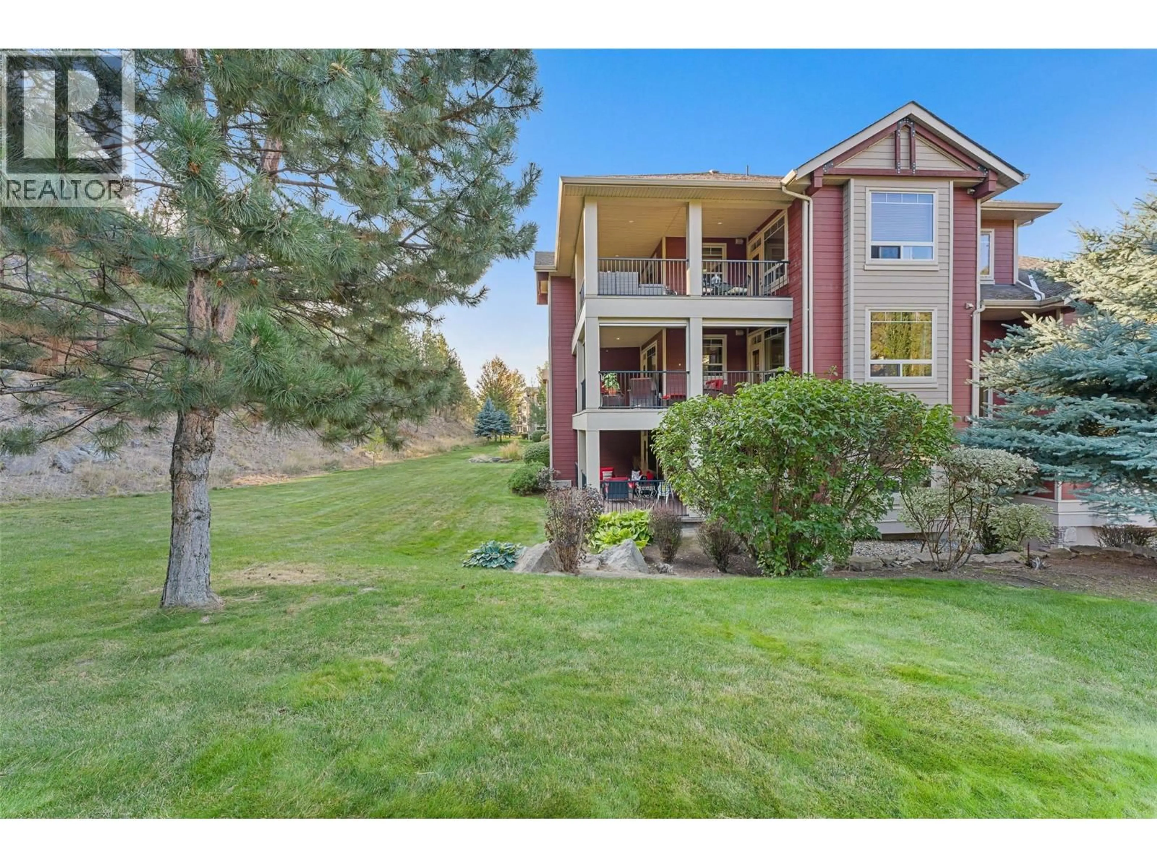 A pic from outside/outdoor area/front of a property/back of a property/a pic from drone, water/lake/river/ocean view for 203 - 2780 AUBURN ROAD, West Kelowna British Columbia V4T4C2