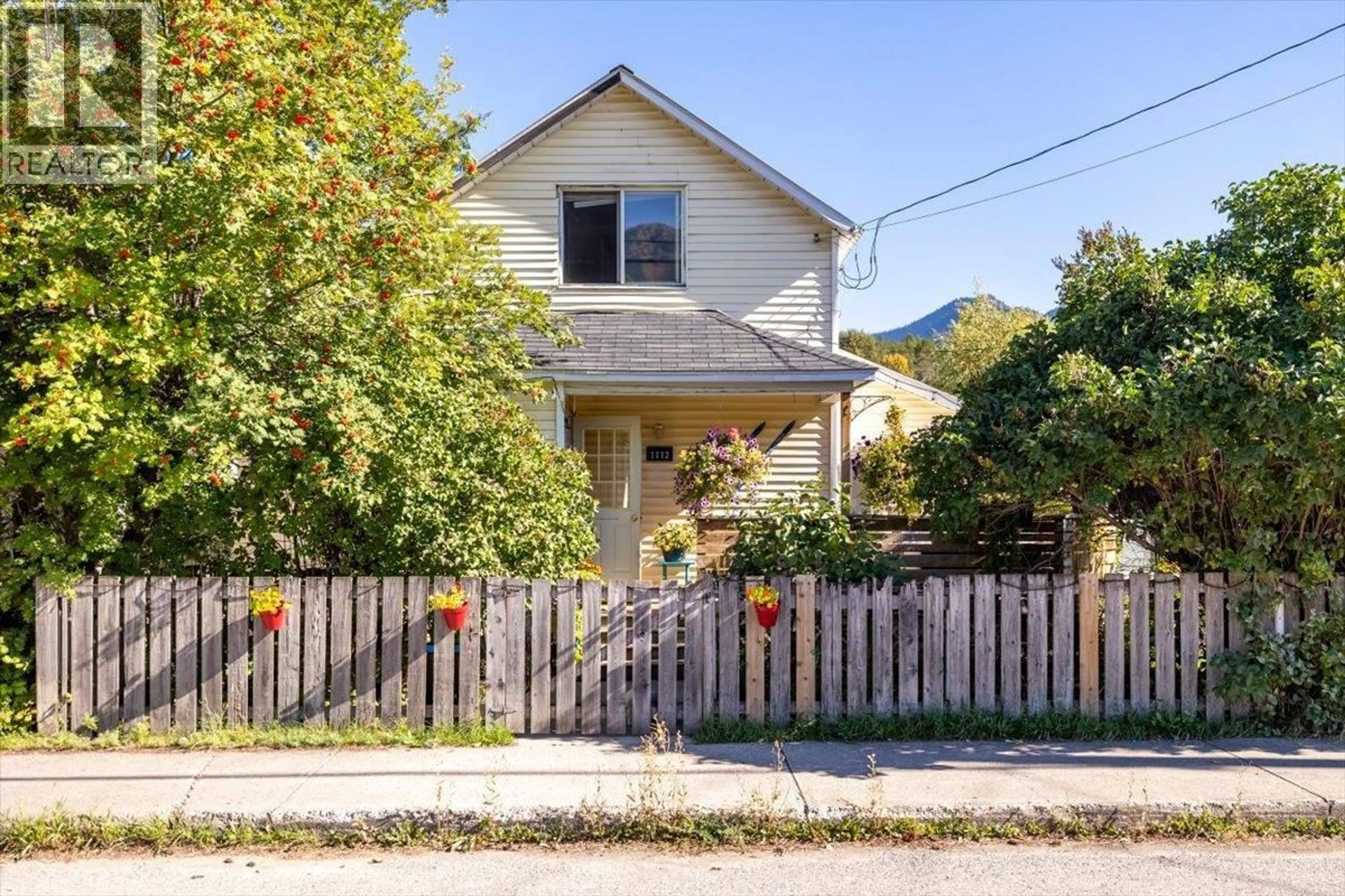 Home with brick exterior material, street for 1112 2ND AVENUE, Fernie British Columbia V0B1M0