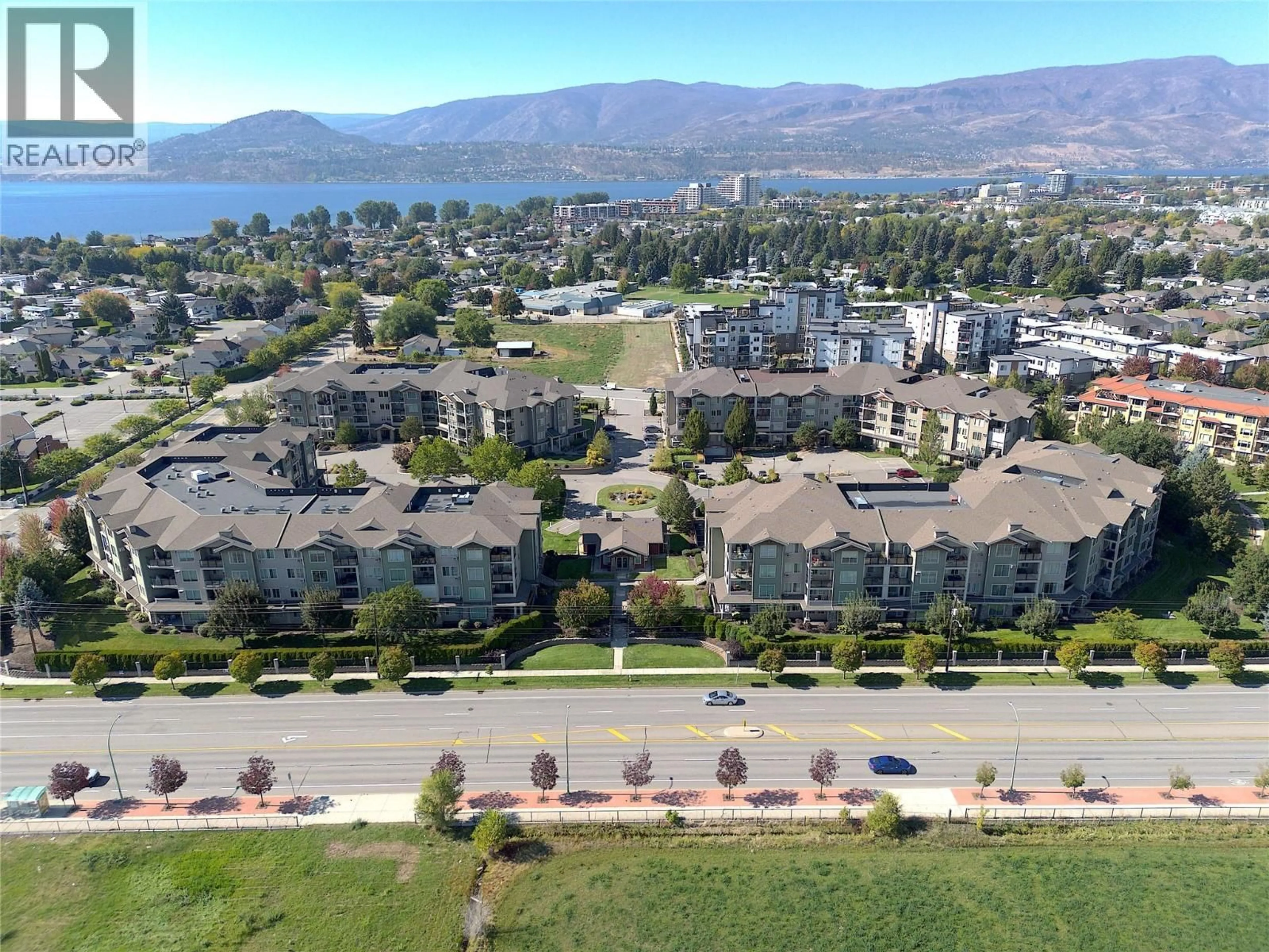 A pic from outside/outdoor area/front of a property/back of a property/a pic from drone, water/lake/river/ocean view for 105 - 3735 CASORSO ROAD, Kelowna British Columbia V1W5G1