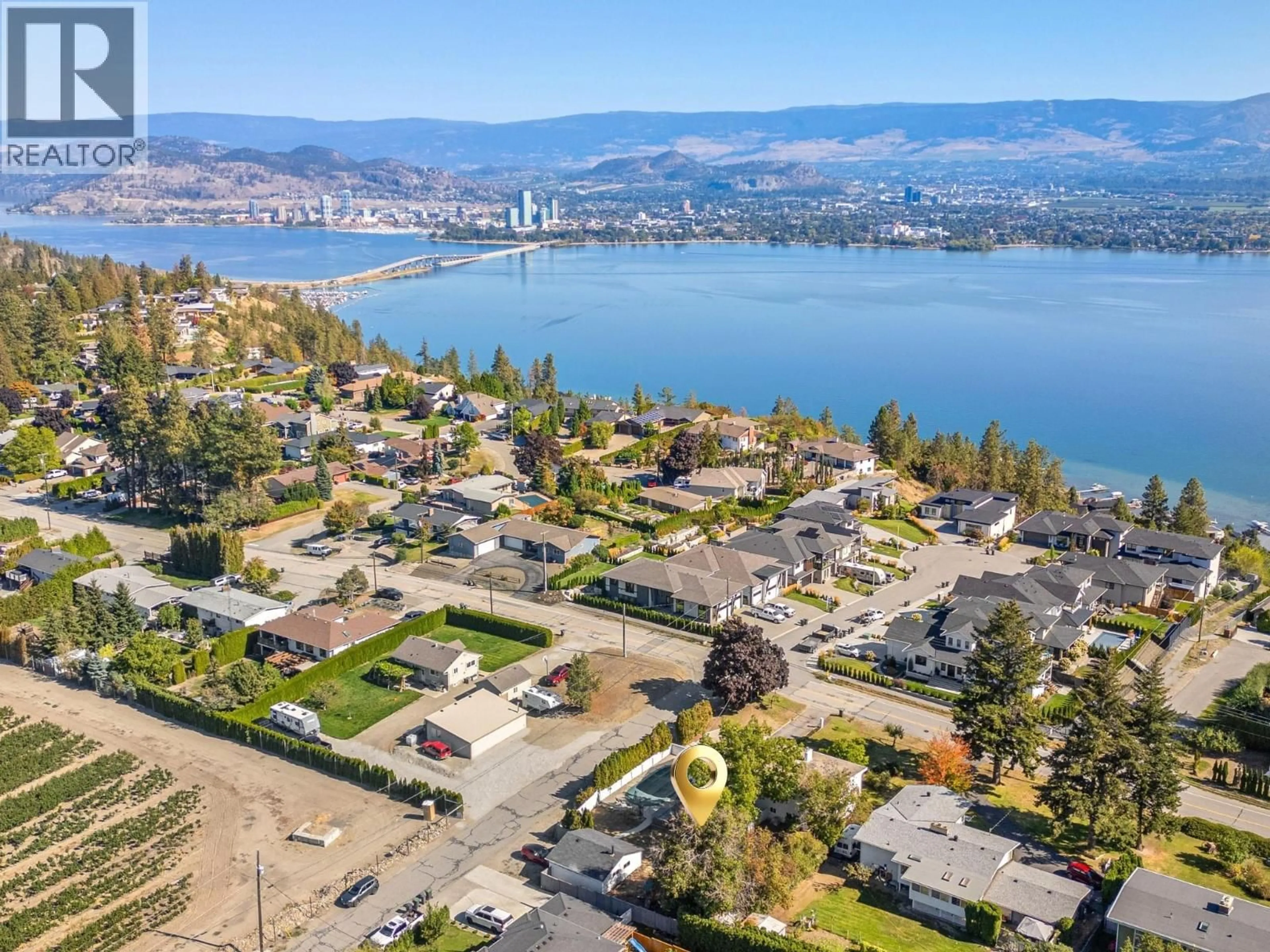 A pic from outside/outdoor area/front of a property/back of a property/a pic from drone, water/lake/river/ocean view for 2618 THACKER DRIVE, West Kelowna British Columbia V1Z1W3