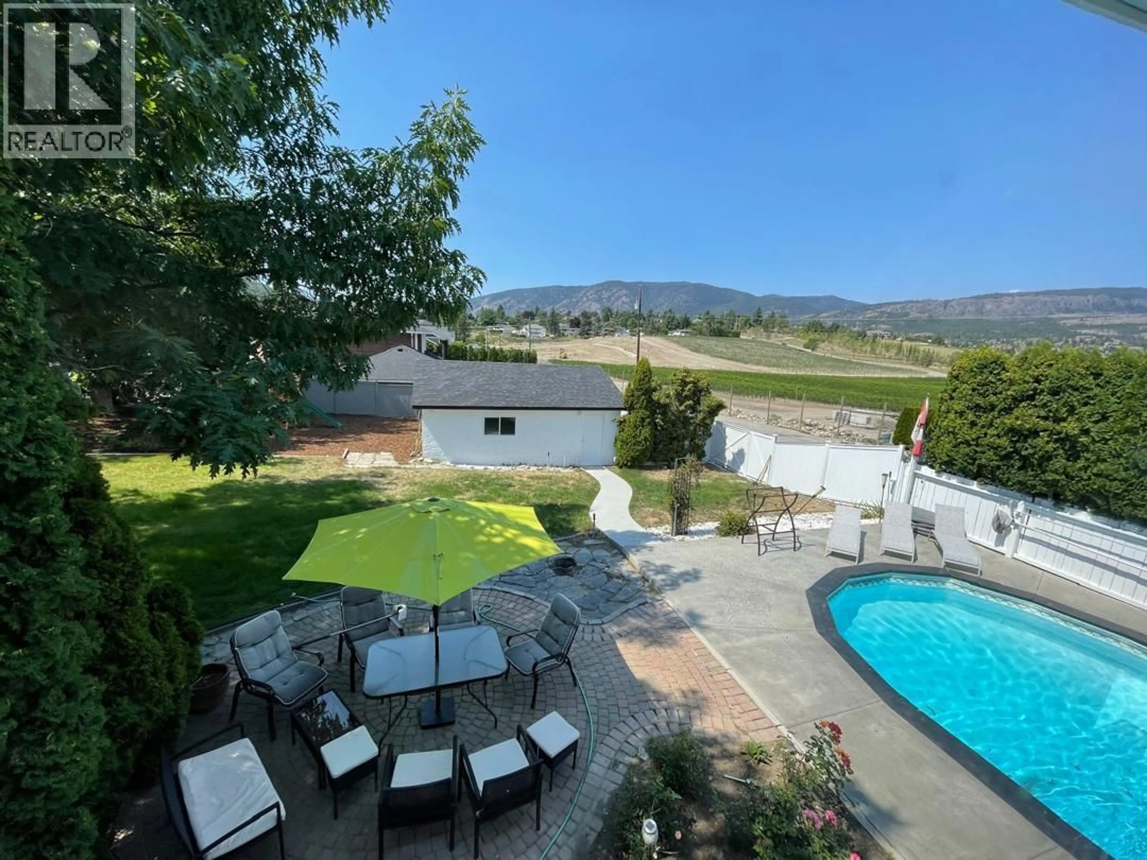 A pic from outside/outdoor area/front of a property/back of a property/a pic from drone, mountain view for 2618 THACKER DRIVE, West Kelowna British Columbia V1Z1W3