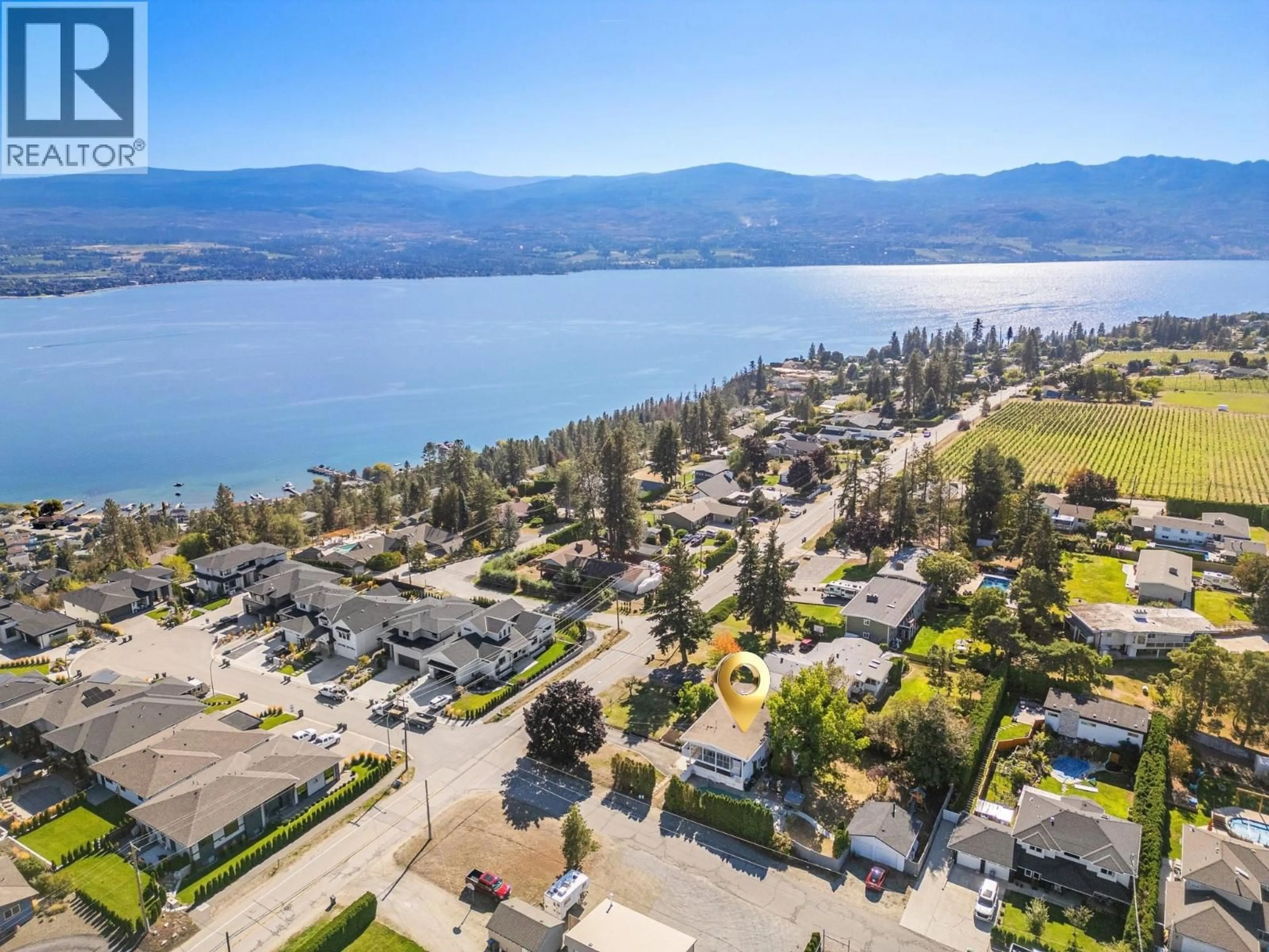 A pic from outside/outdoor area/front of a property/back of a property/a pic from drone, water/lake/river/ocean view for 2618 THACKER DRIVE, West Kelowna British Columbia V1Z1W3