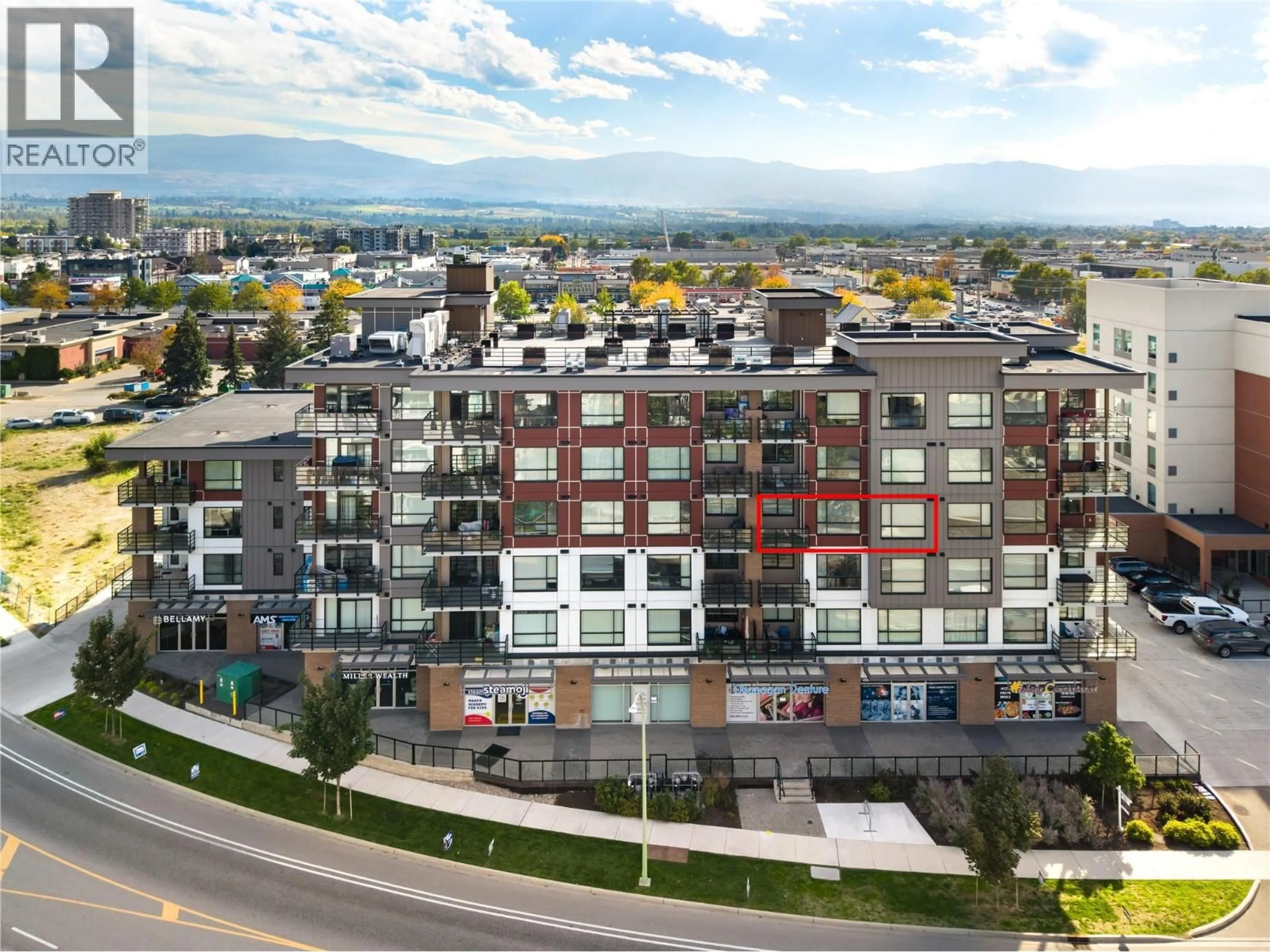 A pic from outside/outdoor area/front of a property/back of a property/a pic from drone, unknown for 406 - 1925 ENTERPRISE WAY, Kelowna British Columbia V1Y0J8