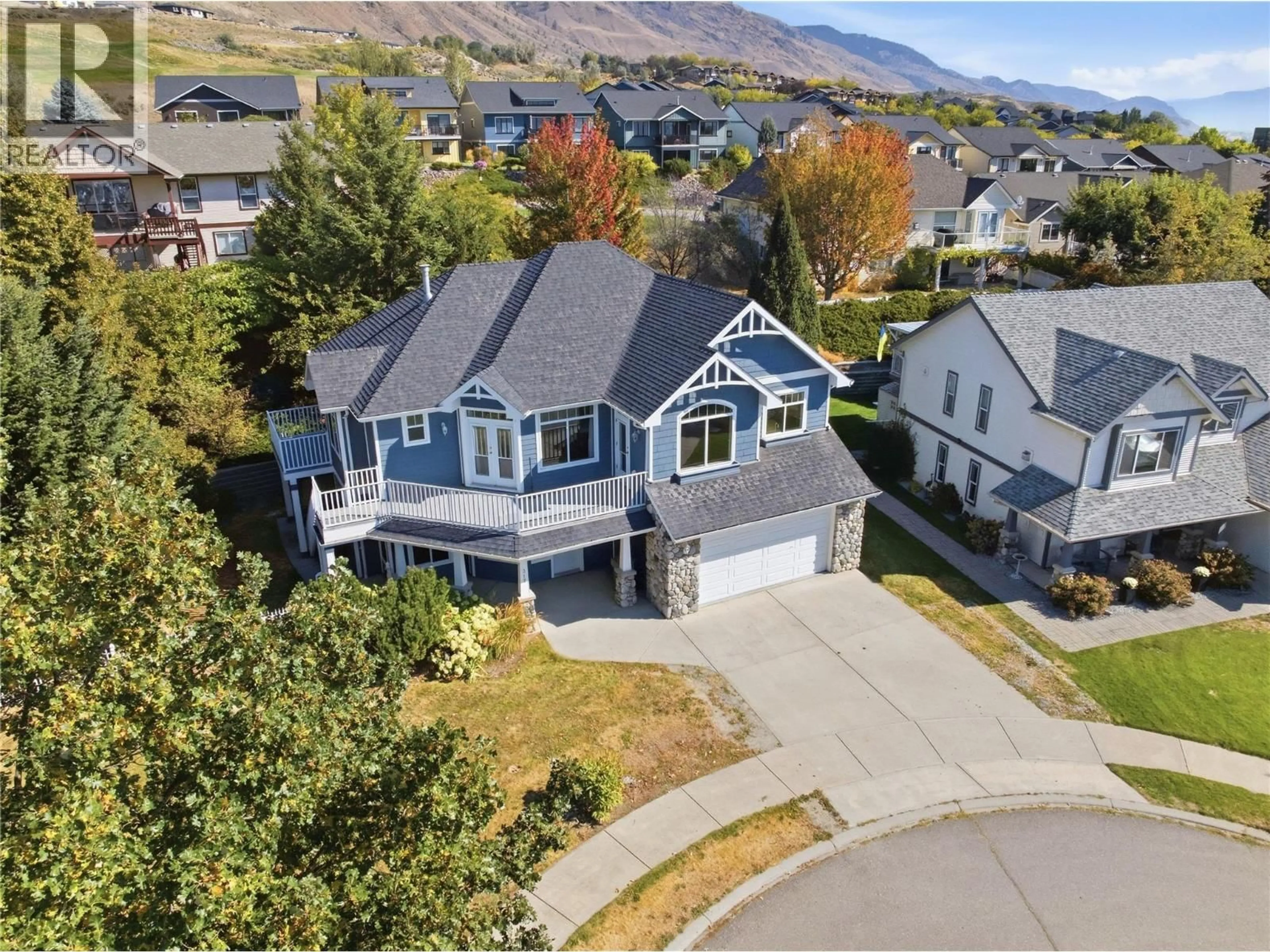 A pic from outside/outdoor area/front of a property/back of a property/a pic from drone, mountain view for 317 MARIPOSA COURT, Kamloops British Columbia V2H1R3