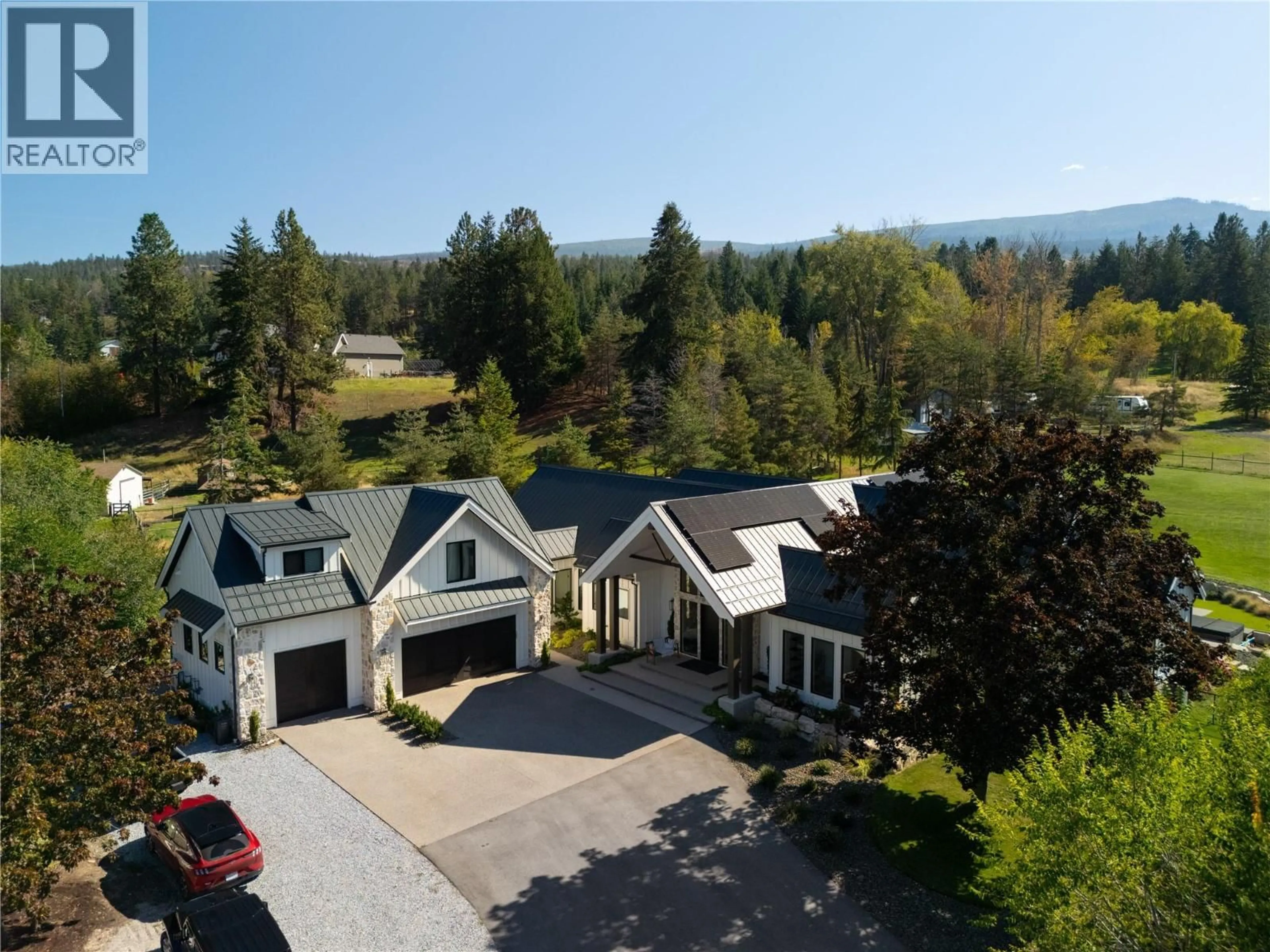 A pic from outside/outdoor area/front of a property/back of a property/a pic from drone, mountain view for 4485 WALLACE HILL ROAD, Kelowna British Columbia V1W4C3