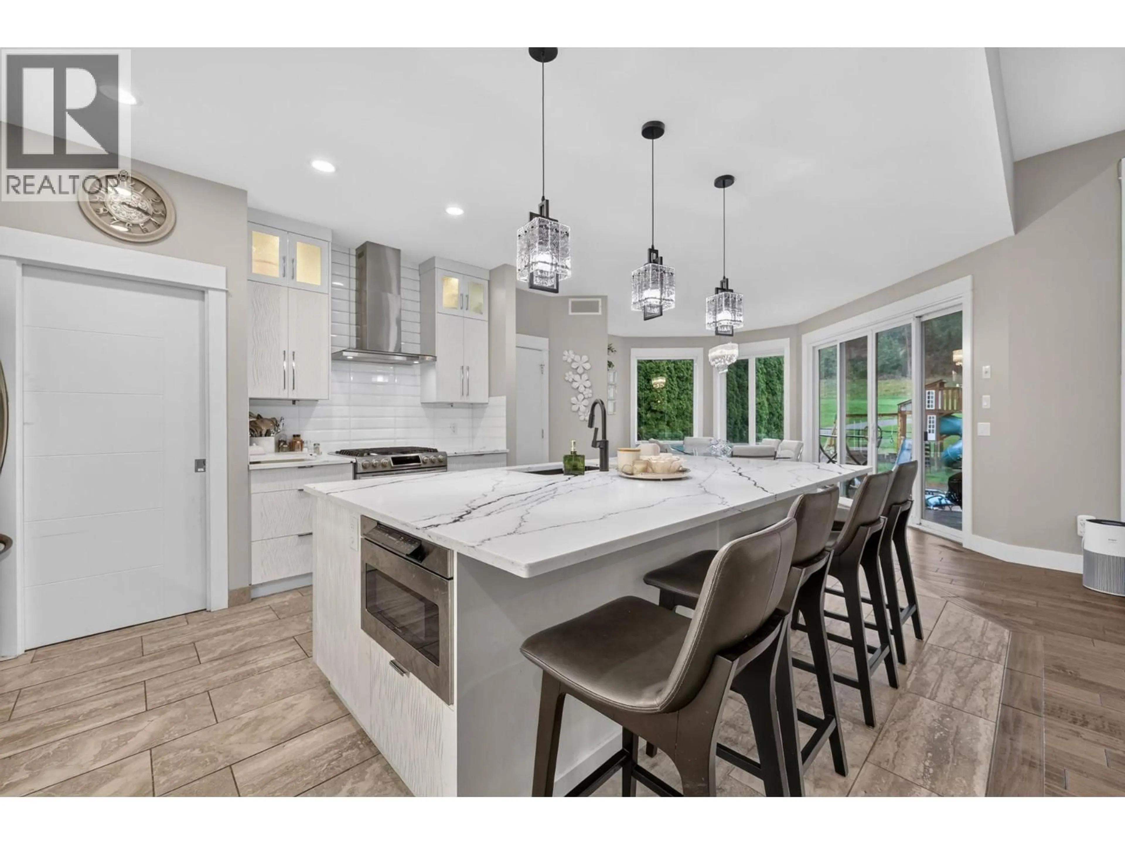 Open concept kitchen, ceramic/tile floor for 3109 CAPISTRANO COURT, Kelowna British Columbia V1V2A3