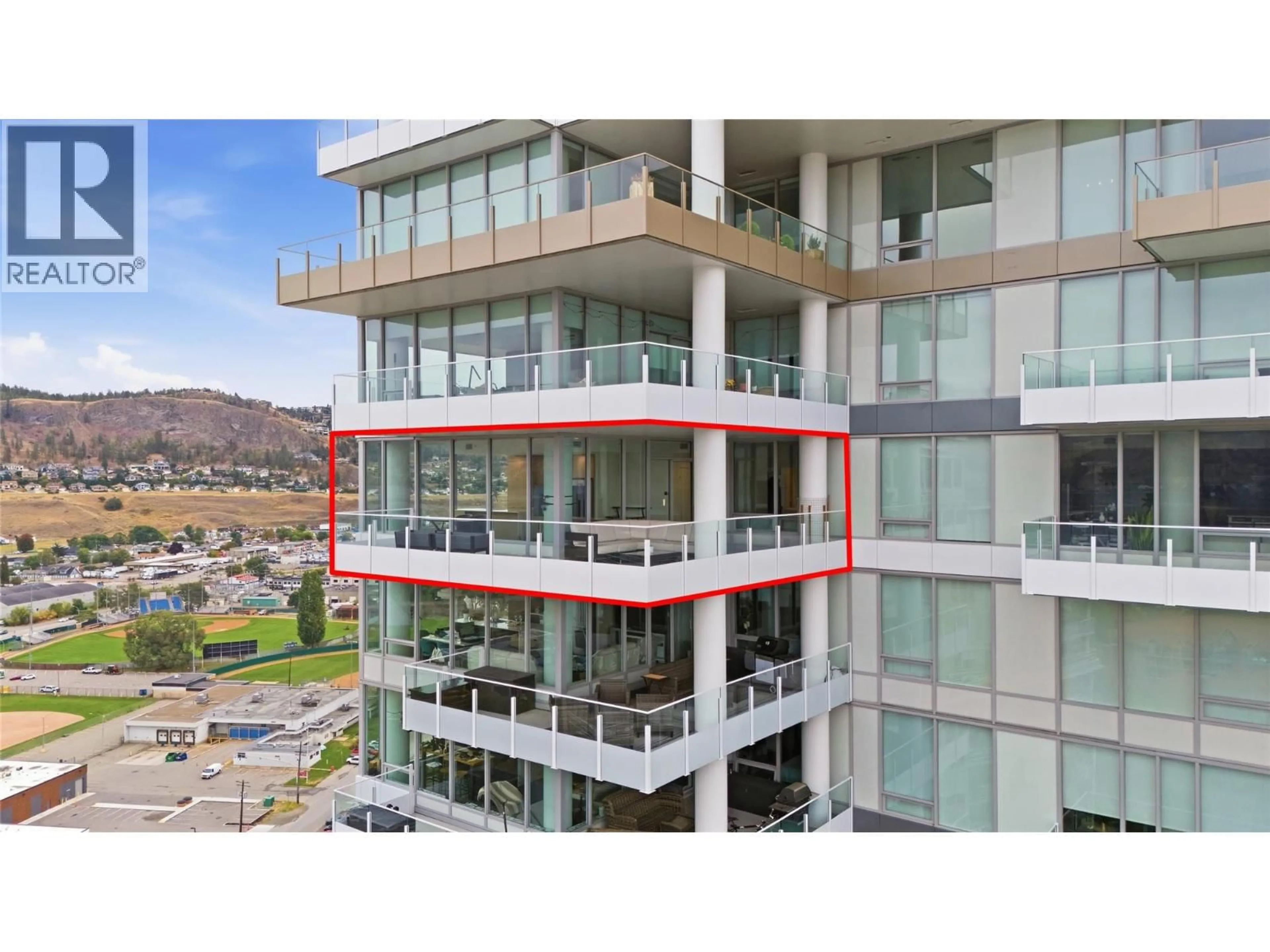 A pic from outside/outdoor area/front of a property/back of a property/a pic from drone, unknown for 2306 - 1181 SUNSET DRIVE, Kelowna British Columbia V1Y0L4