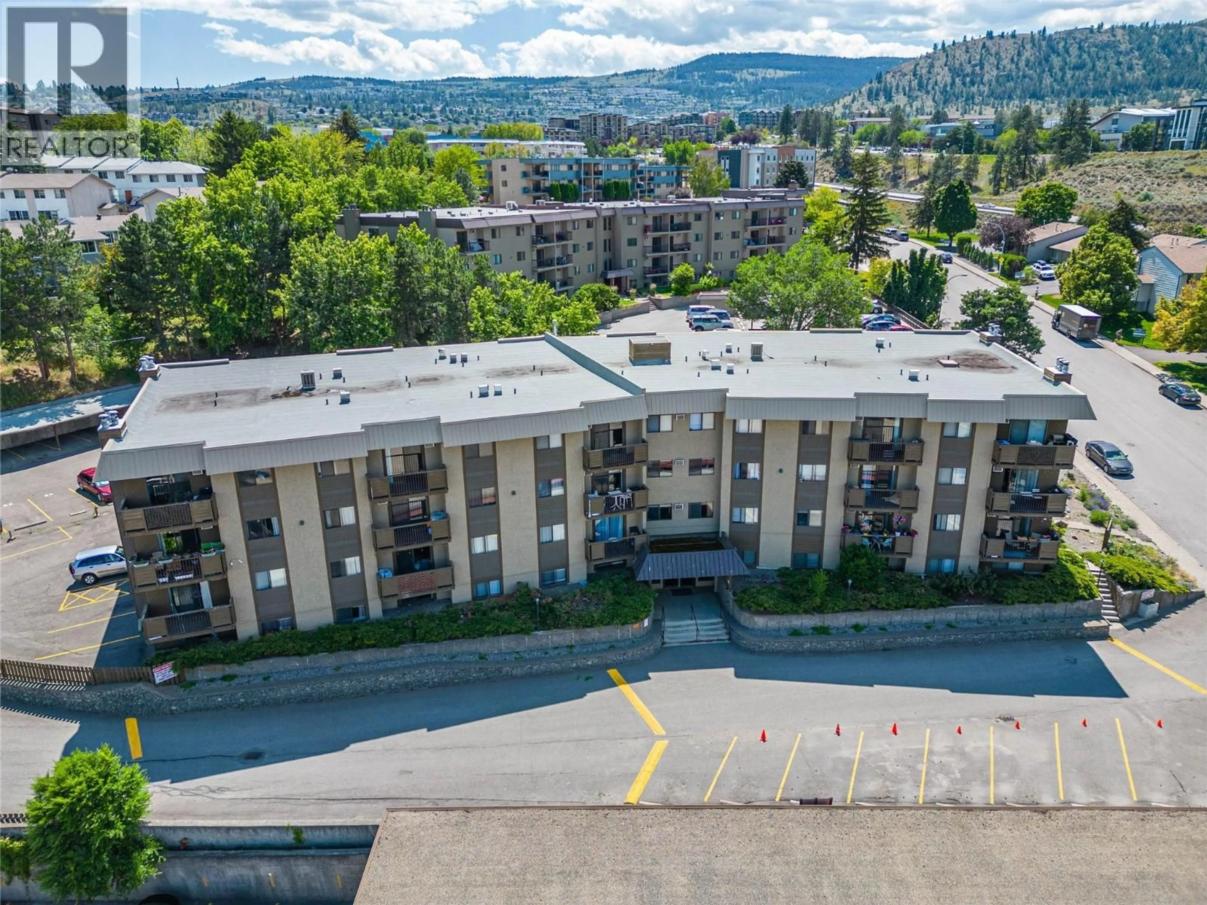 A pic from outside/outdoor area/front of a property/back of a property/a pic from drone, unknown for 106 - 555 DALGLEISH DRIVE, Kamloops British Columbia V2C6C7