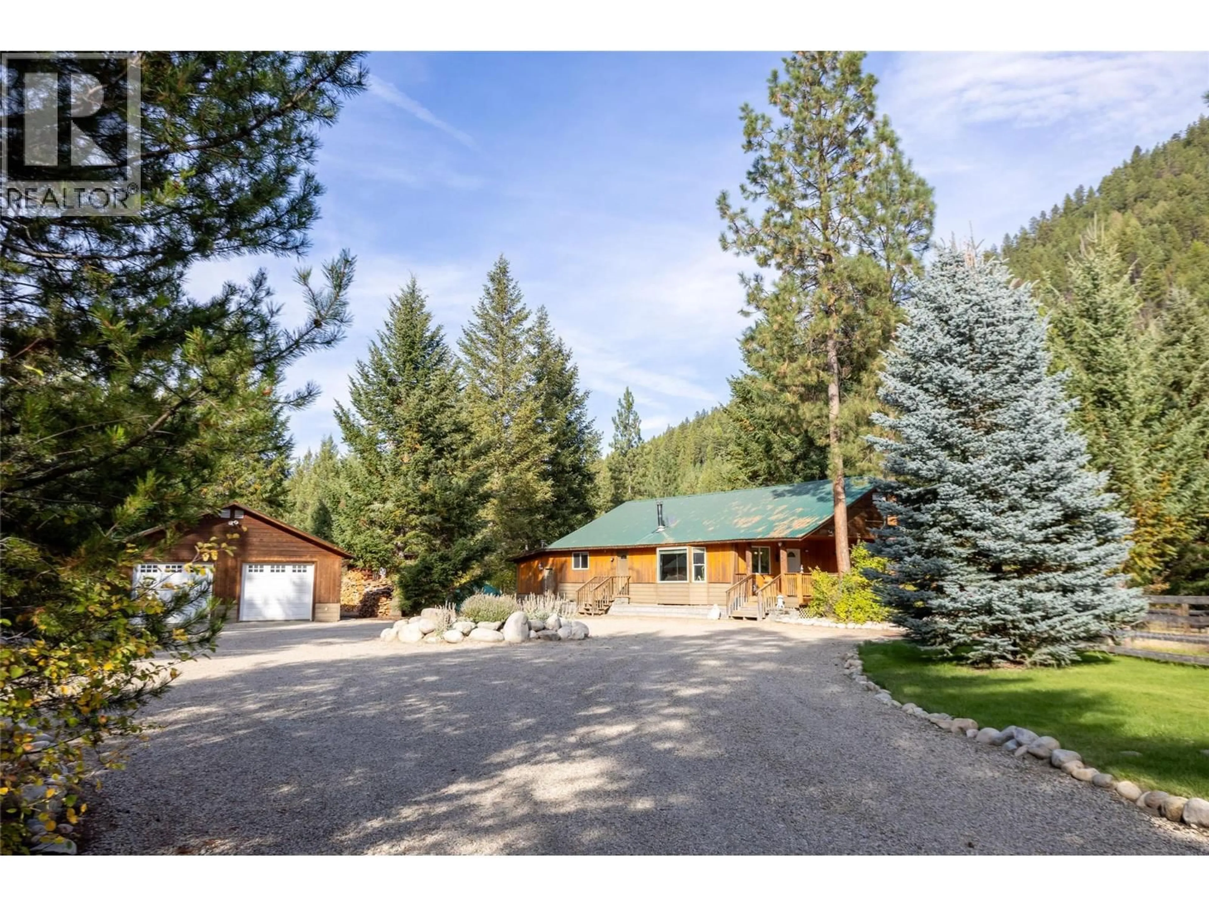 A pic from outside/outdoor area/front of a property/back of a property/a pic from drone, mountain view for 50 TAYLOR WAY, Beaverdell British Columbia V0H1A0