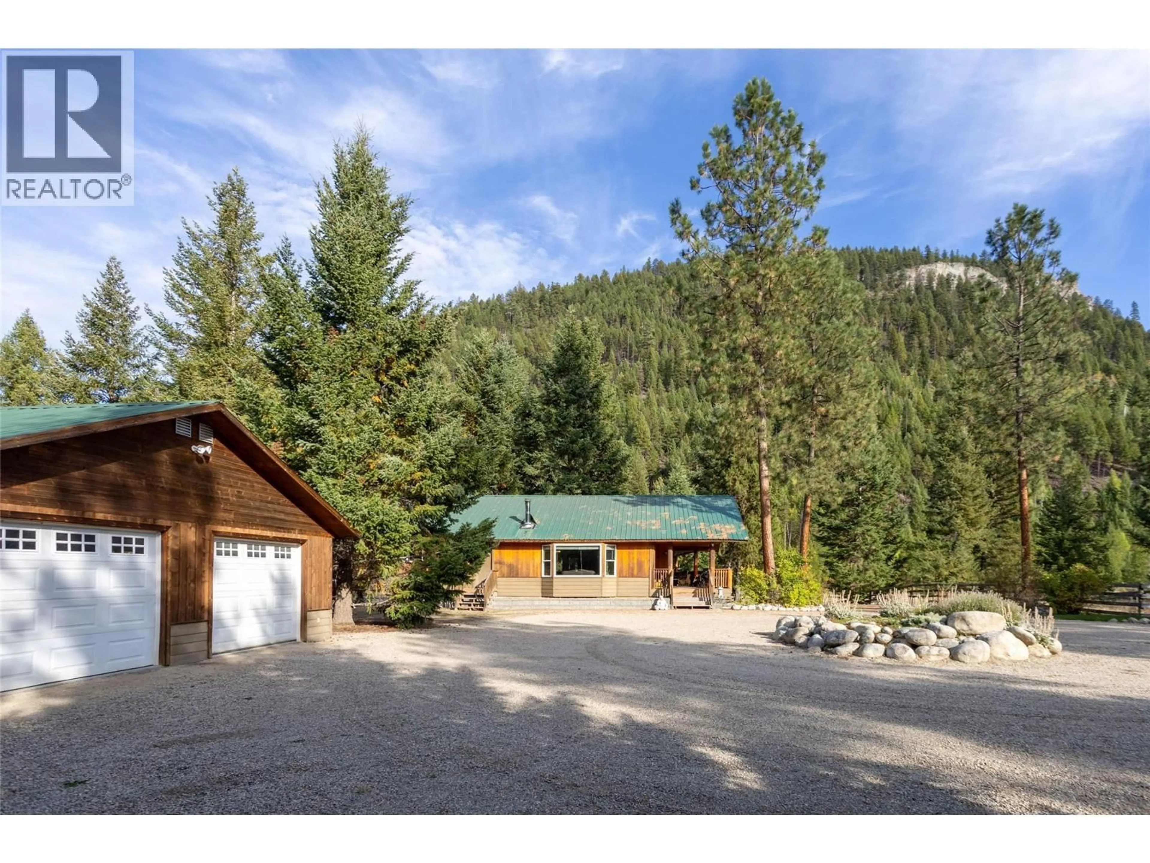A pic from outside/outdoor area/front of a property/back of a property/a pic from drone, mountain view for 50 TAYLOR WAY, Beaverdell British Columbia V0H1A0