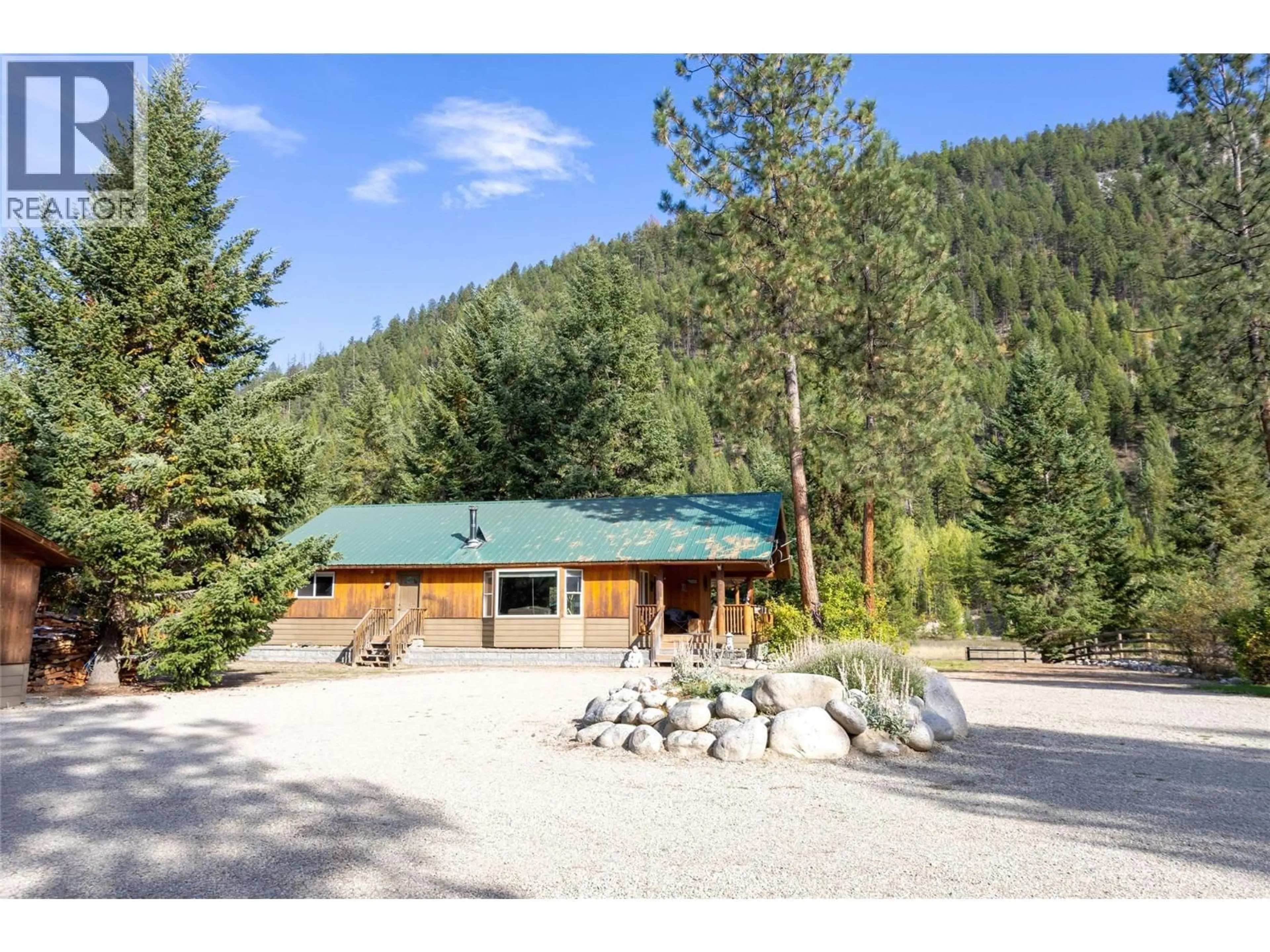 A pic from outside/outdoor area/front of a property/back of a property/a pic from drone, mountain view for 50 TAYLOR WAY, Beaverdell British Columbia V0H1A0