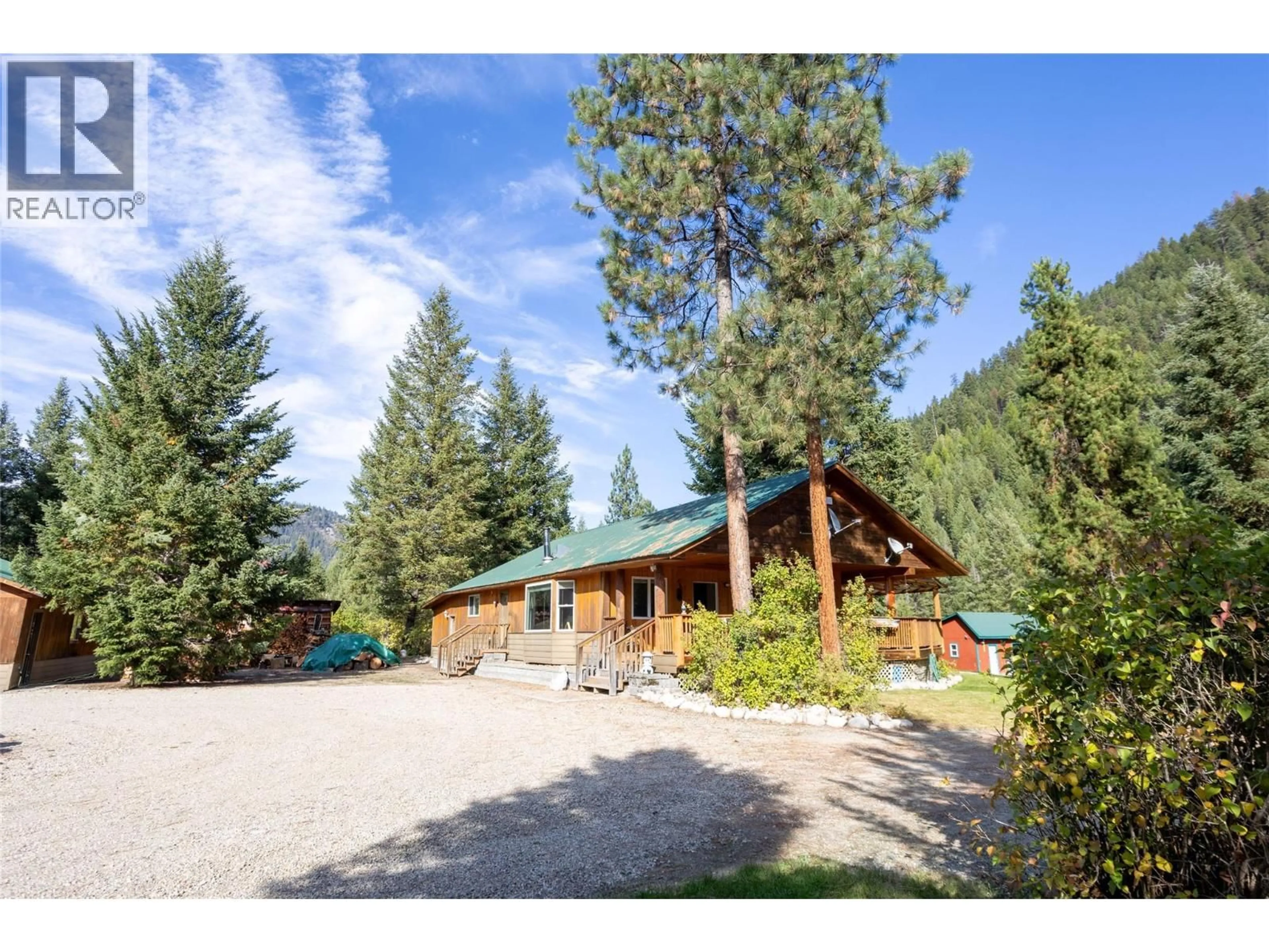 A pic from outside/outdoor area/front of a property/back of a property/a pic from drone, mountain view for 50 TAYLOR WAY, Beaverdell British Columbia V0H1A0