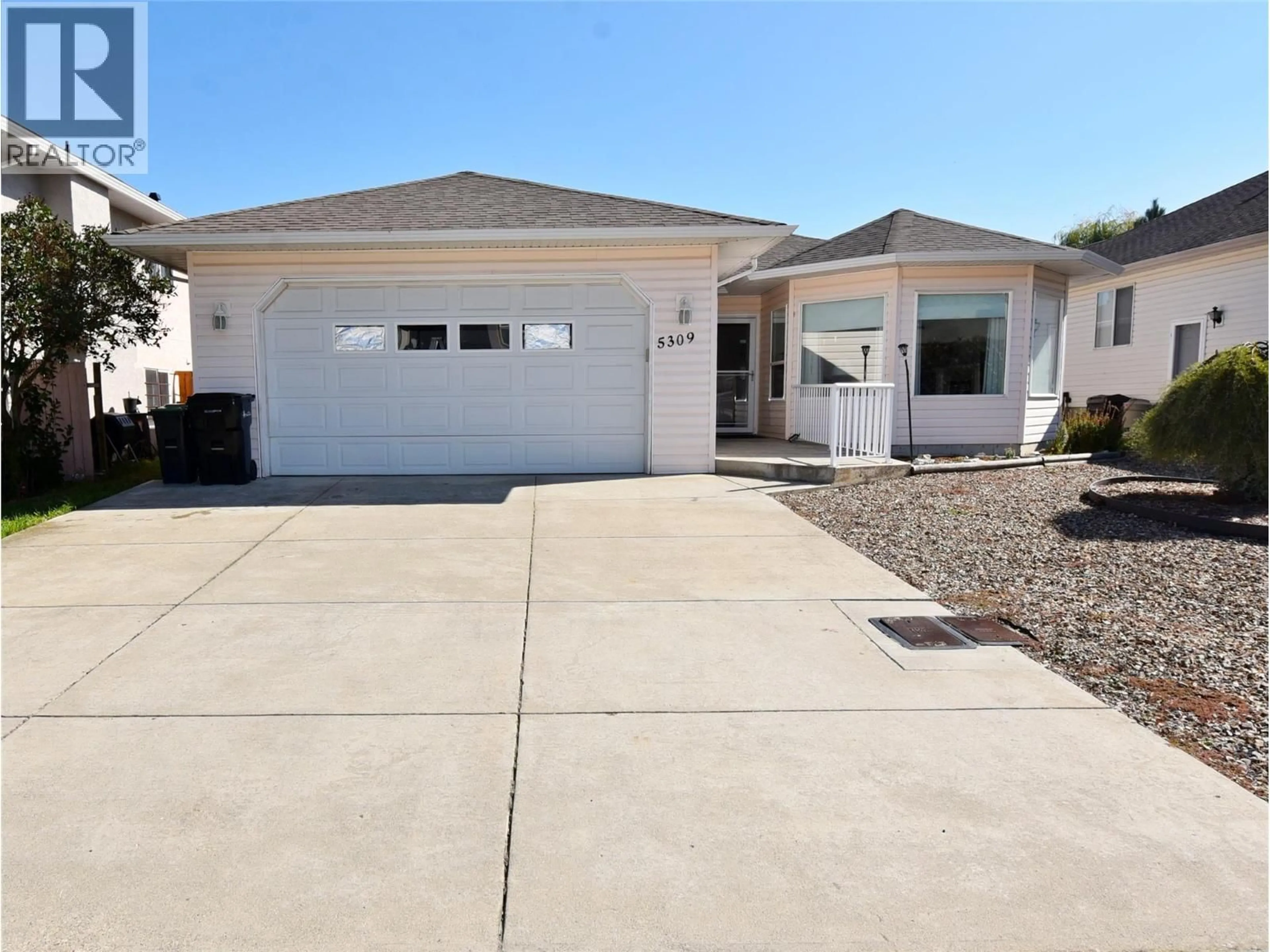 Home with vinyl exterior material, street for 5309 21 STREET, Vernon British Columbia V1T9N2