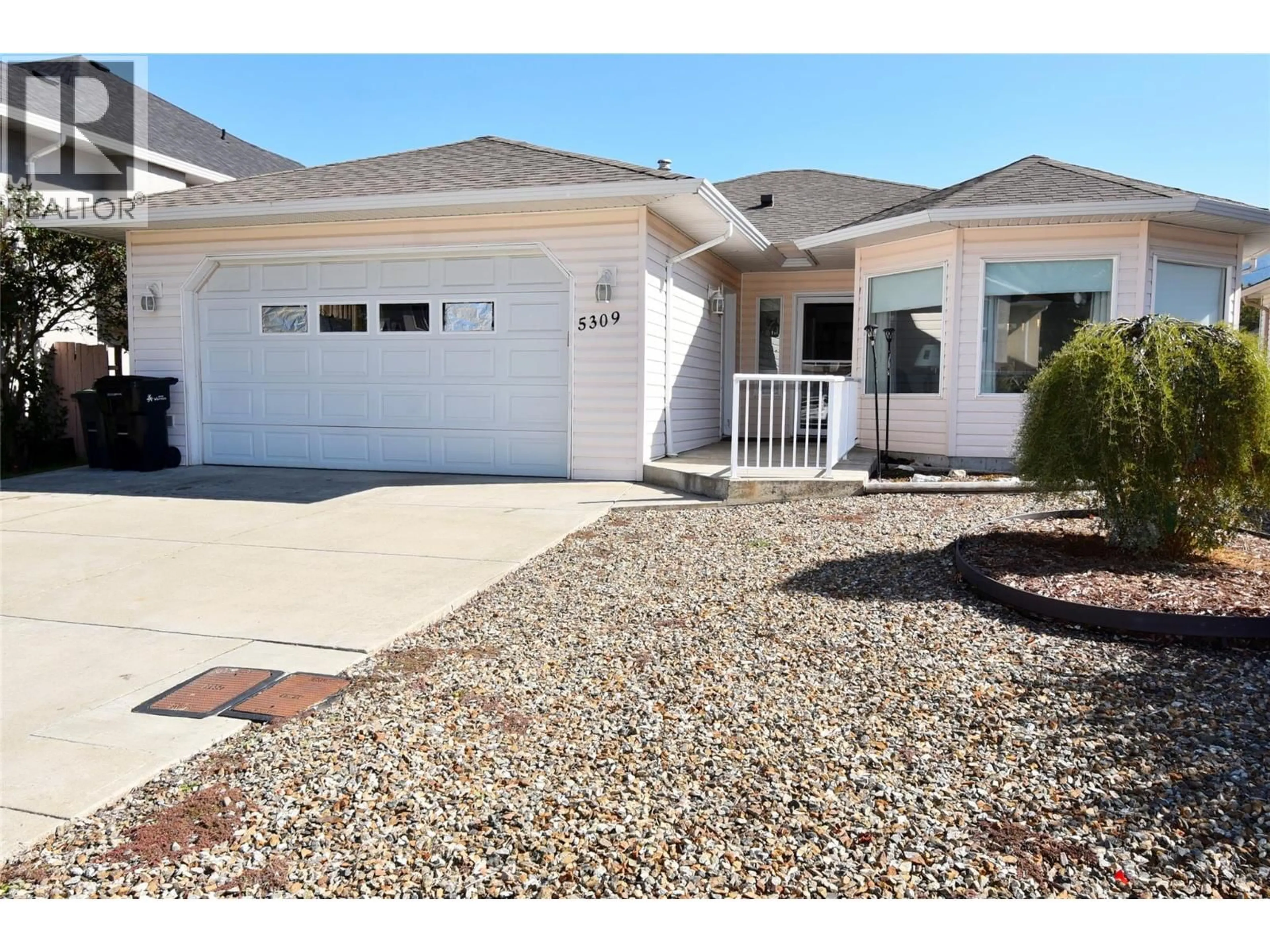 Home with vinyl exterior material, street for 5309 21 STREET, Vernon British Columbia V1T9N2