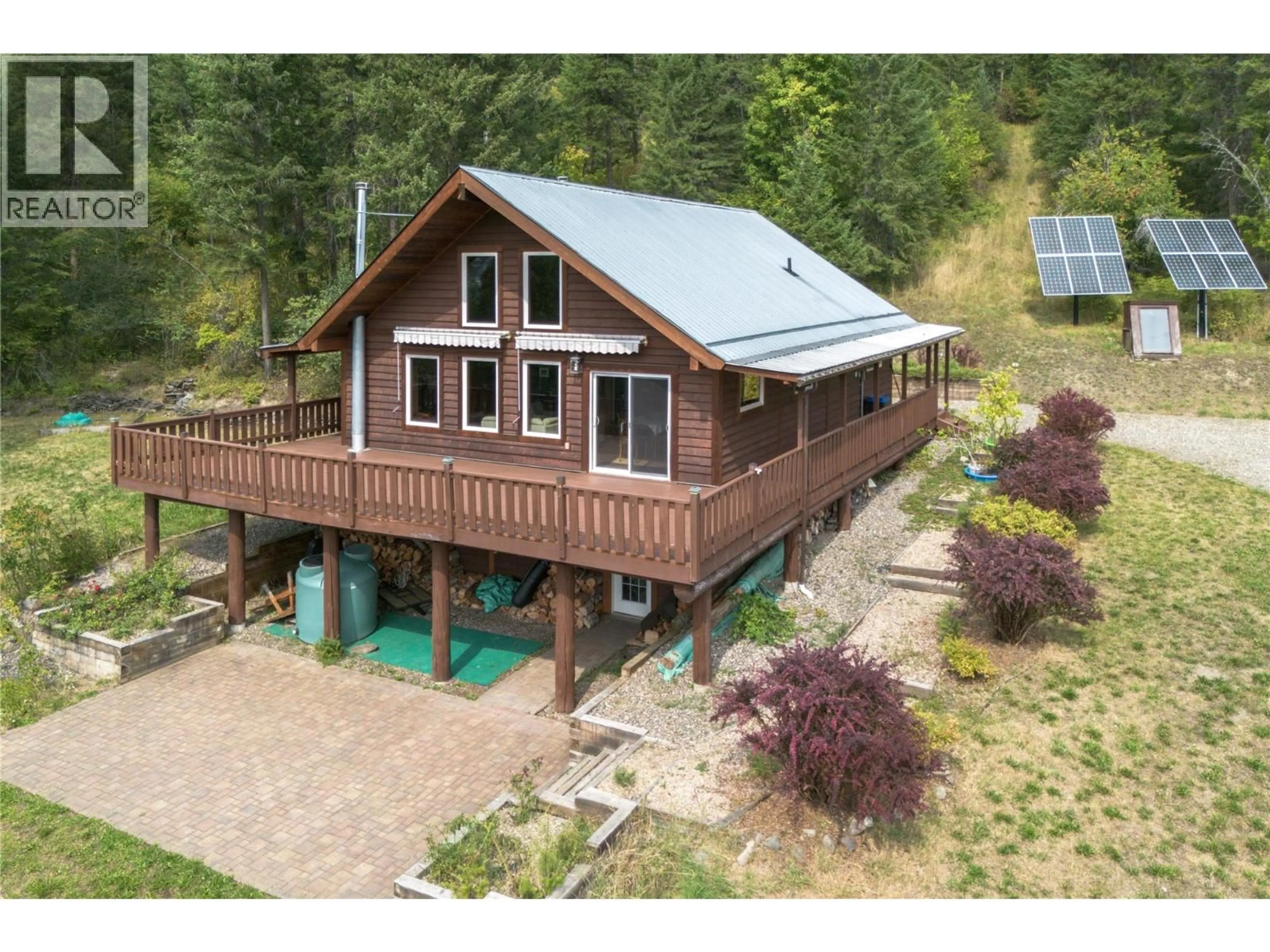 A pic from outside/outdoor area/front of a property/back of a property/a pic from drone, building for 27 PINE ROAD, Cherryville British Columbia V0E2G3