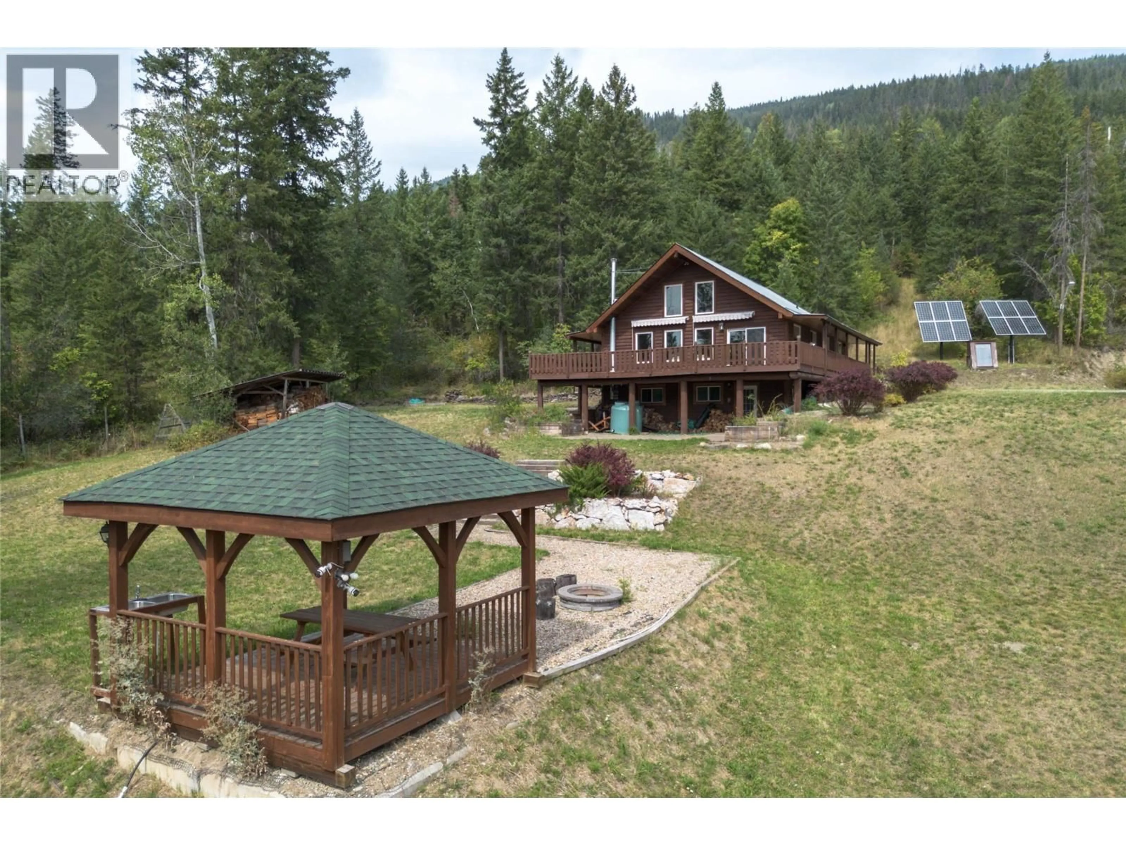 A pic from outside/outdoor area/front of a property/back of a property/a pic from drone, mountain view for 27 PINE ROAD, Cherryville British Columbia V0E2G3