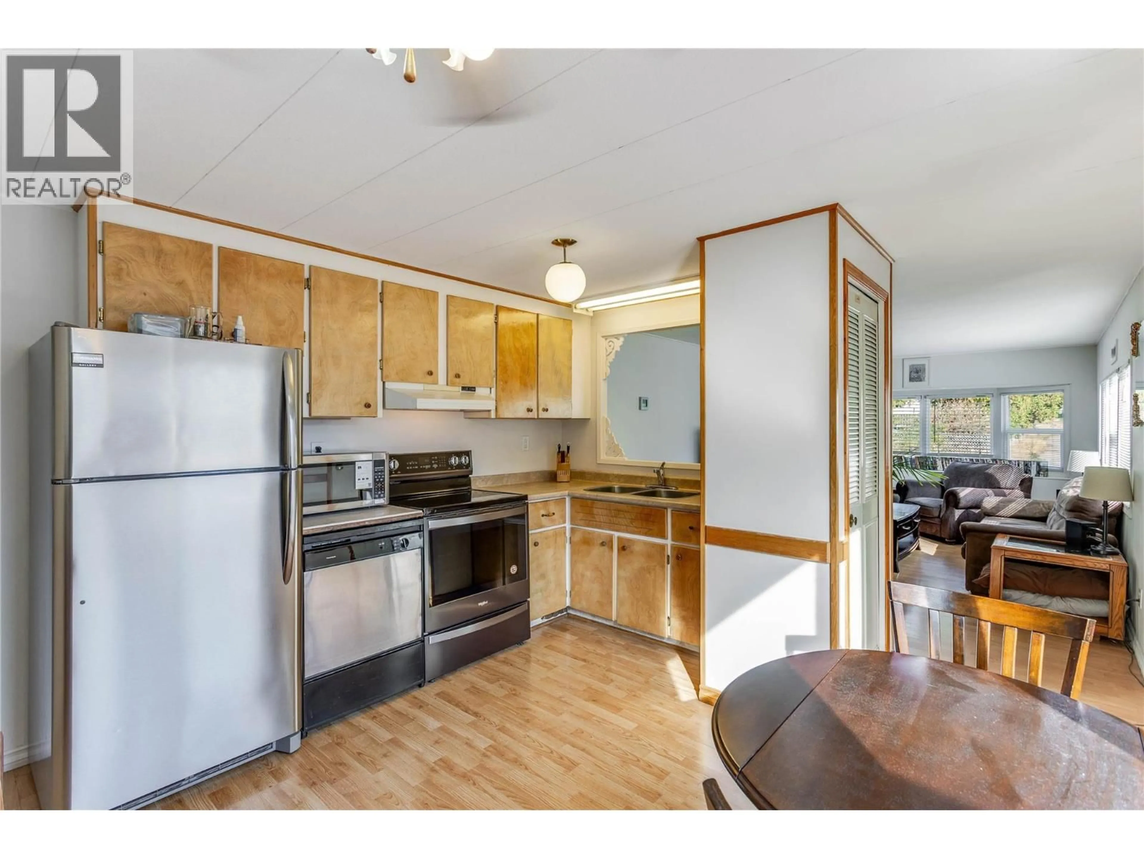 Standard kitchen, wood/laminate floor for 213 - 1699 ROSS ROAD, West Kelowna British Columbia V1Z1L8