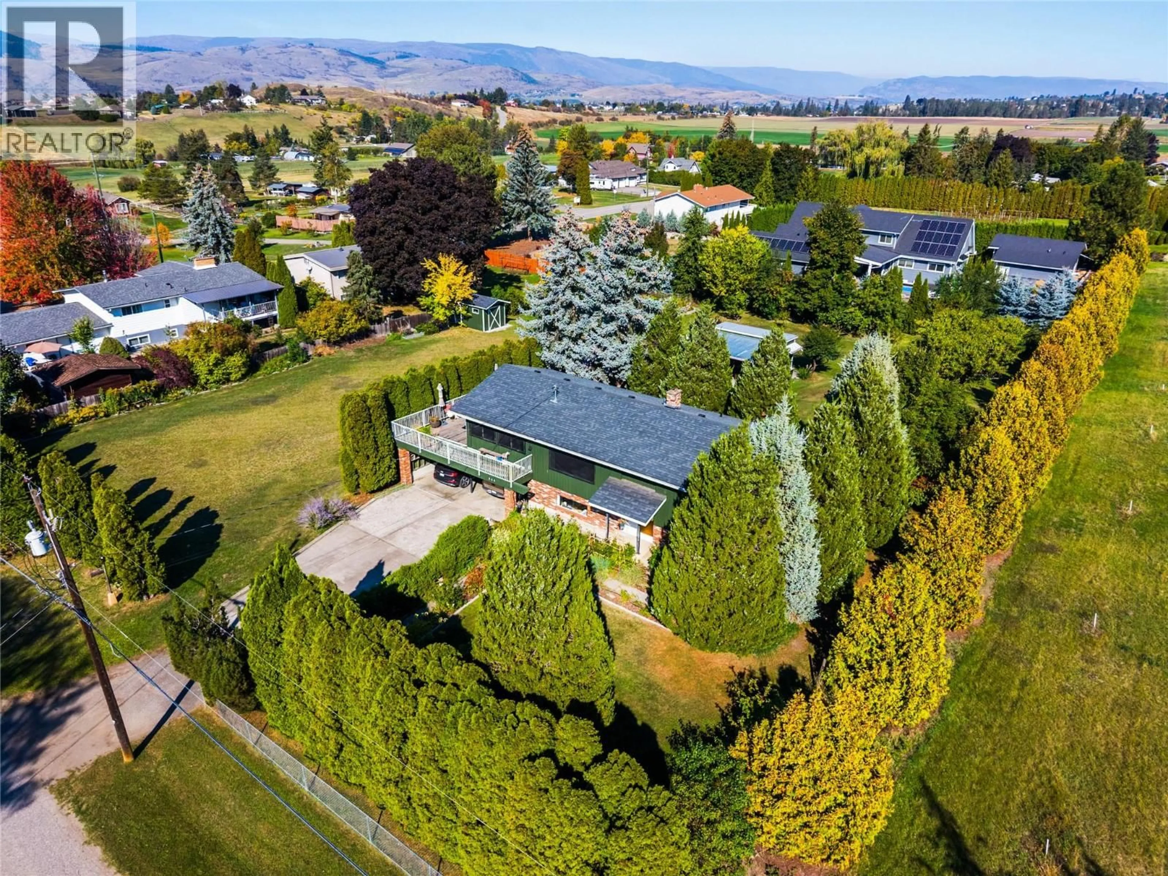 A pic from outside/outdoor area/front of a property/back of a property/a pic from drone, mountain view for 583 MCLEISH ROAD, Vernon British Columbia V1B3H5