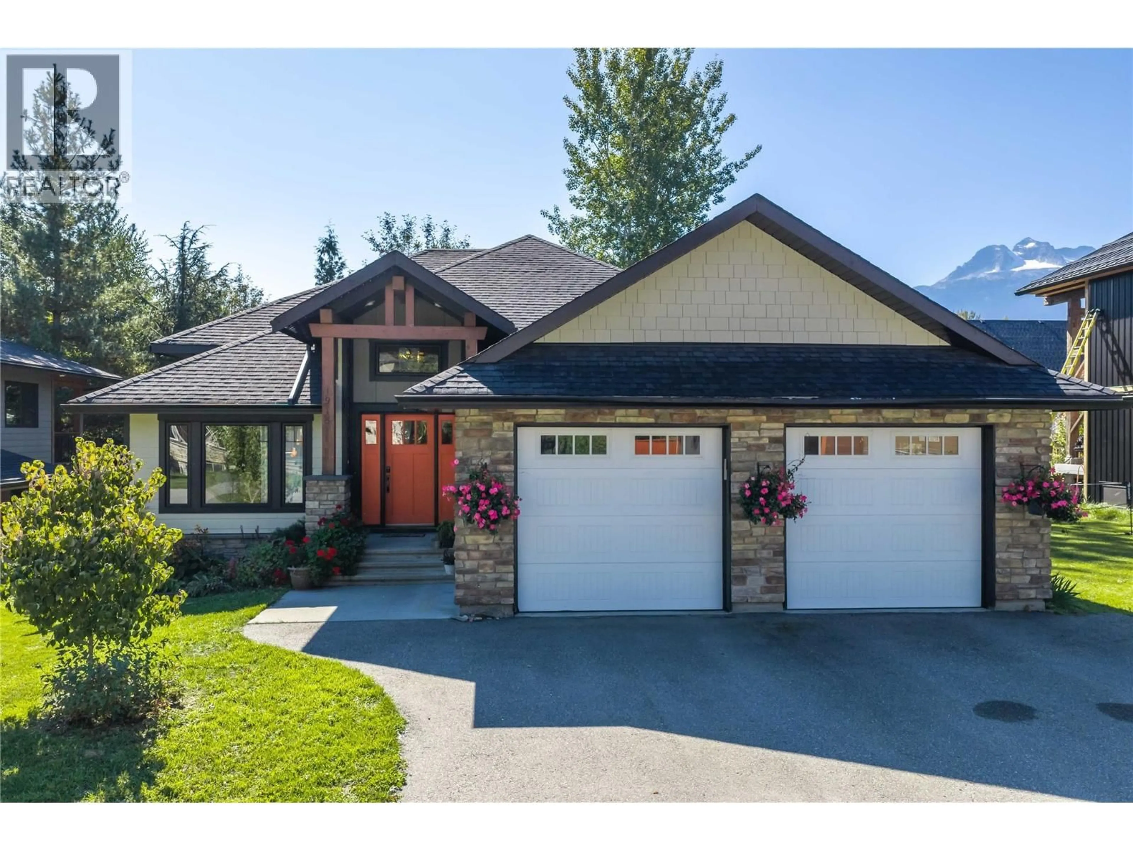 Home with brick exterior material, street for 1915 ASPEN CRESCENT, Revelstoke British Columbia V0E2S3