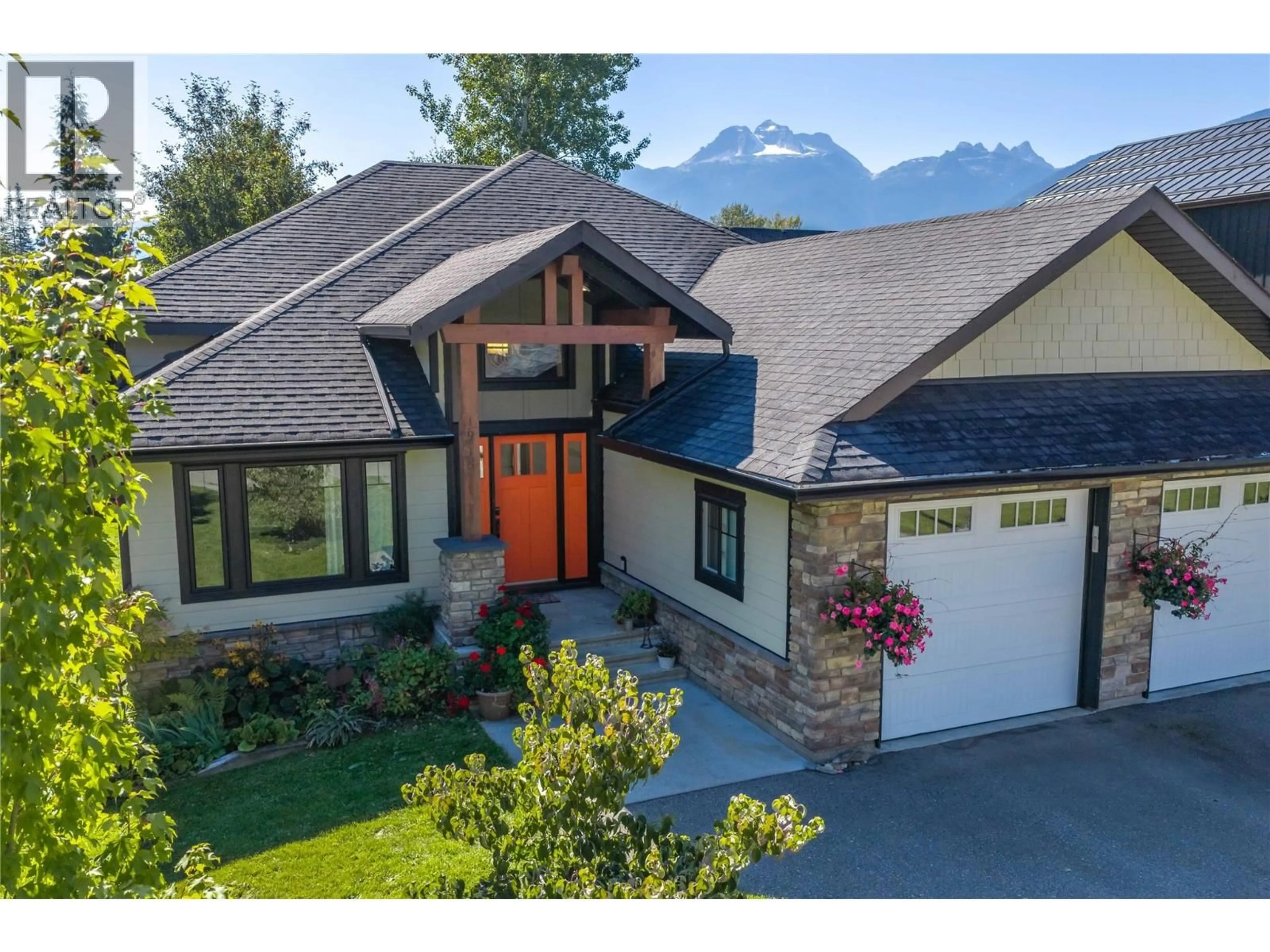 A pic from outside/outdoor area/front of a property/back of a property/a pic from drone, mountain view for 1915 ASPEN CRESCENT, Revelstoke British Columbia V0E2S3