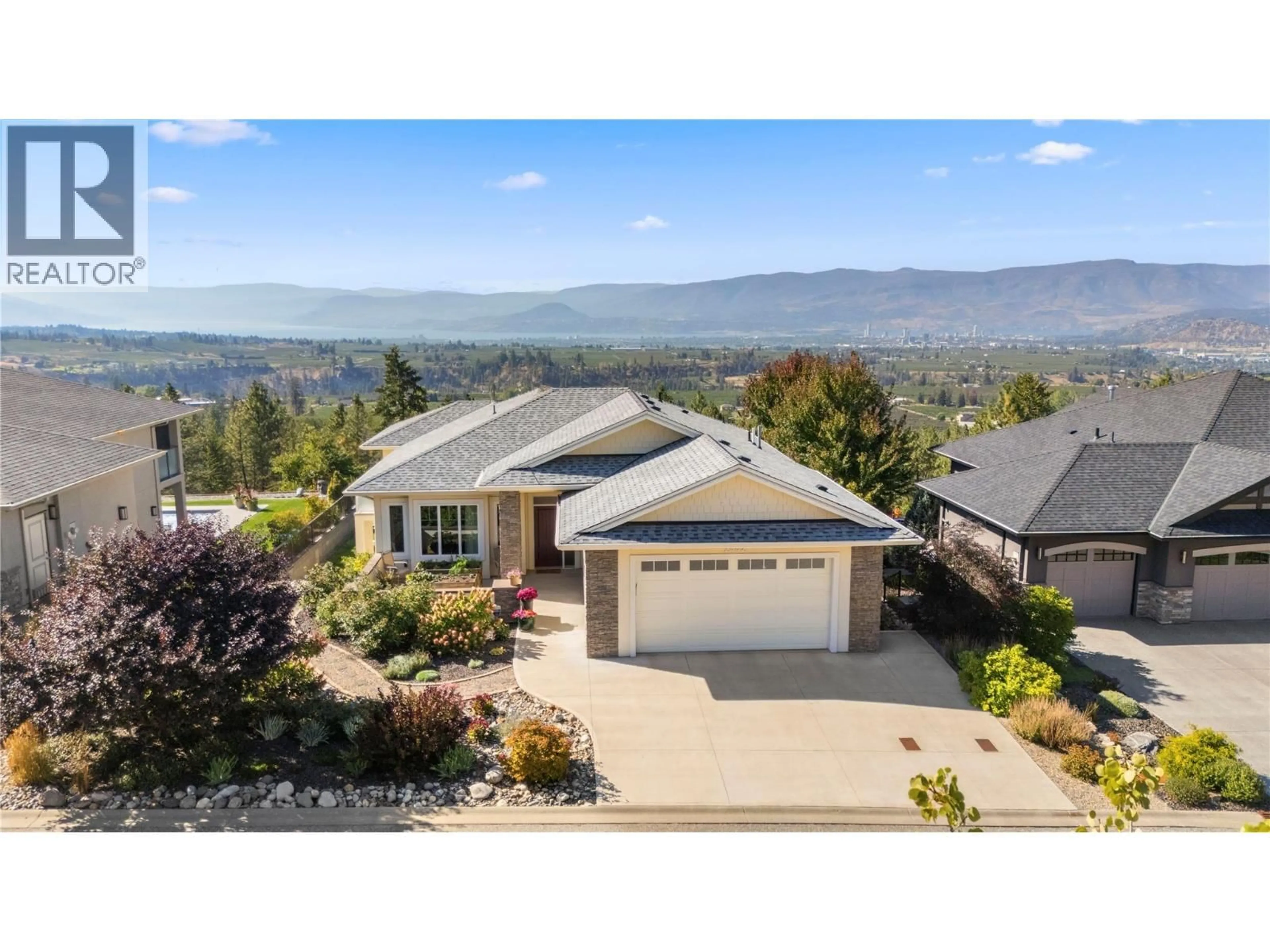 A pic from outside/outdoor area/front of a property/back of a property/a pic from drone, mountain view for 2442 BELLA VISTA STREET, Kelowna British Columbia V1P1S1