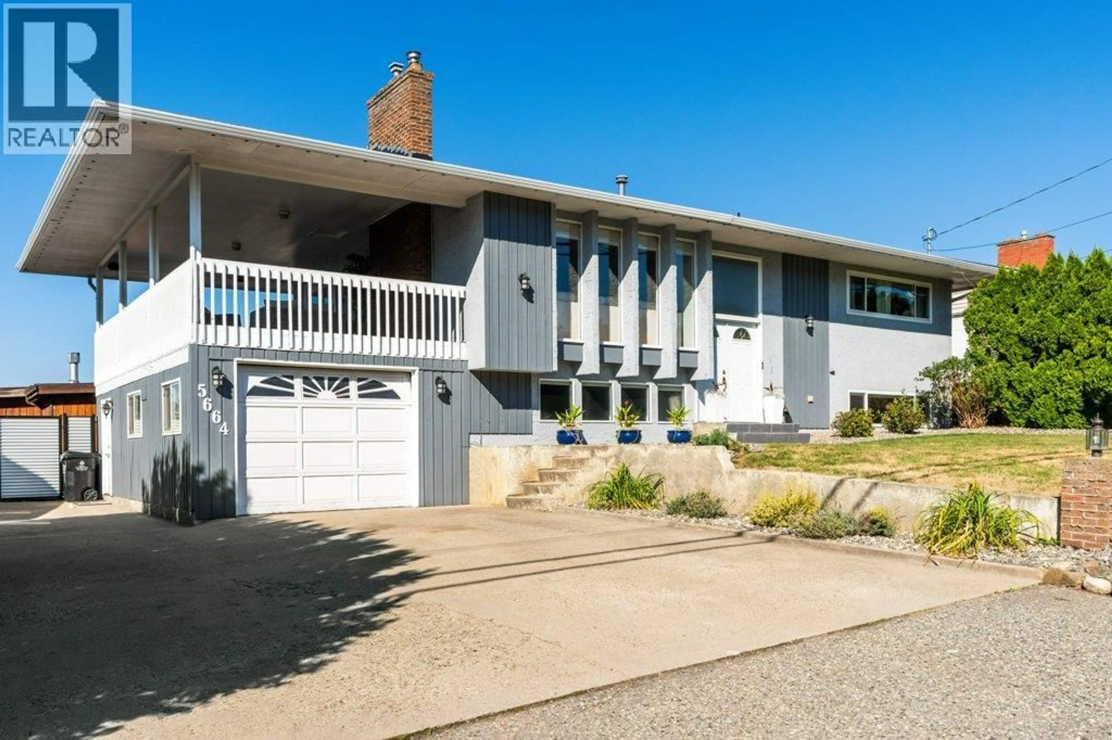 Home with vinyl exterior material, street for 5664 L & A ROAD, Vernon British Columbia V1B3P7