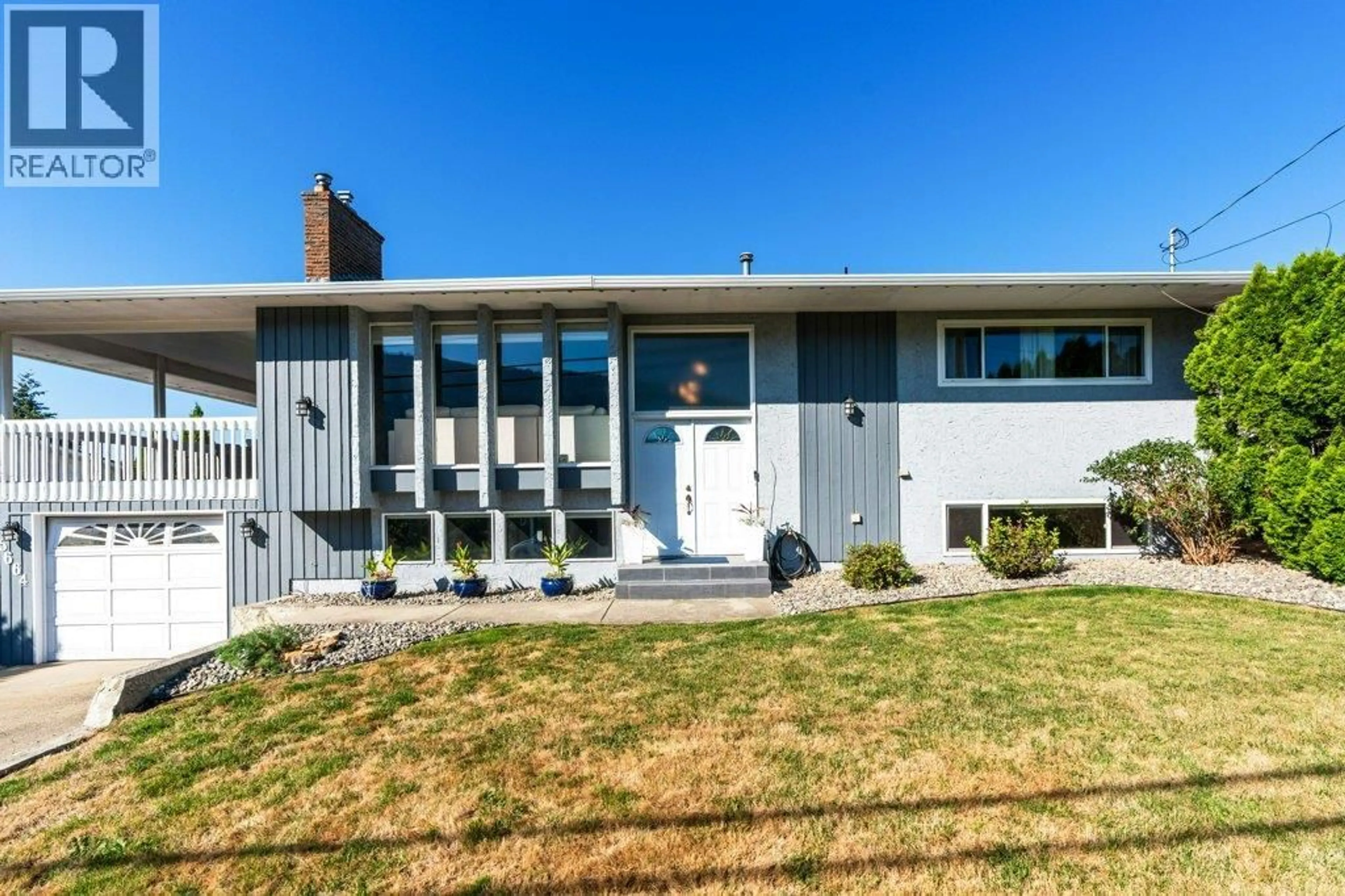 Home with vinyl exterior material, street for 5664 L & A ROAD, Vernon British Columbia V1B3P7