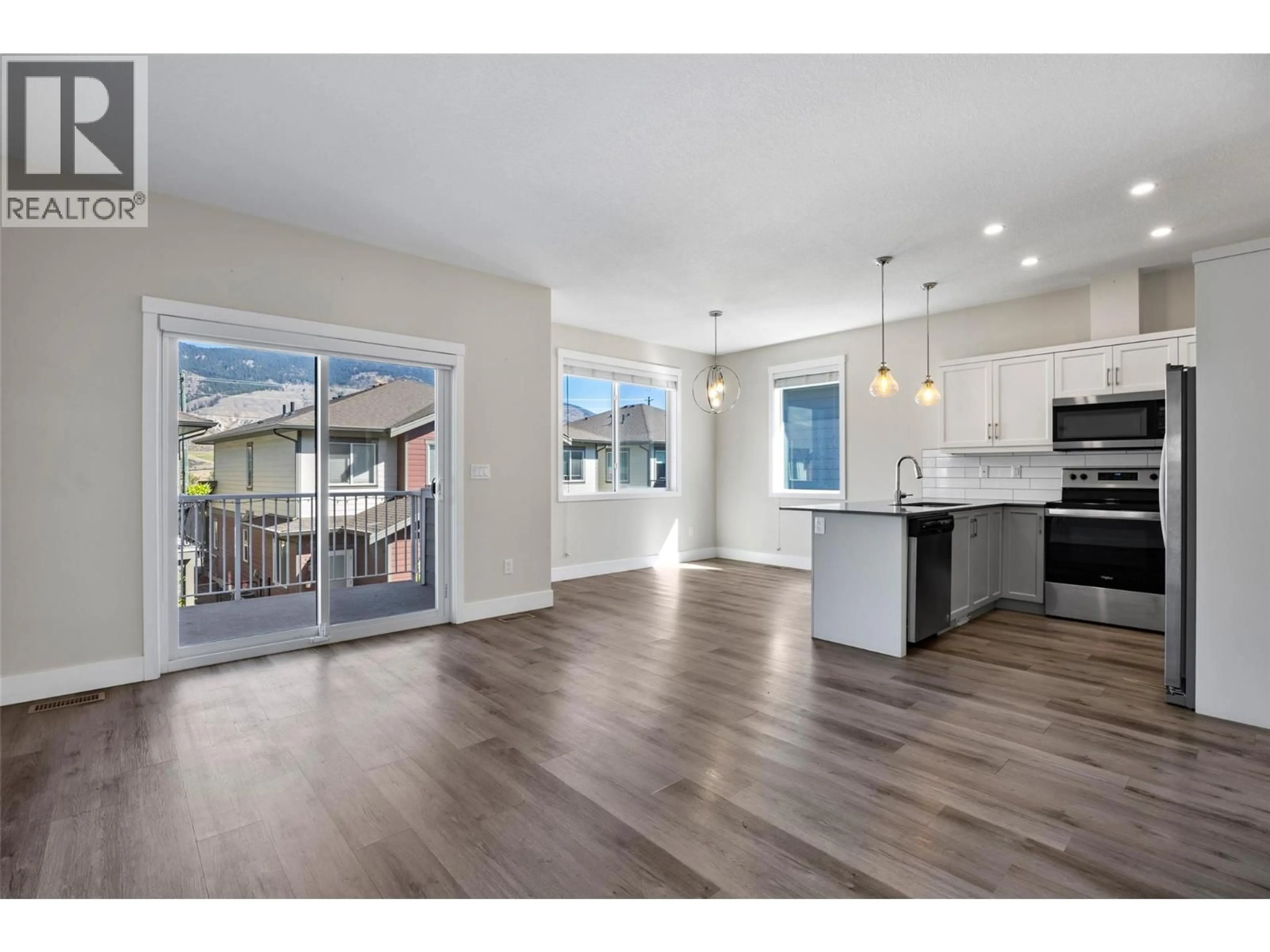 Open concept kitchen, wood/laminate floor for 175 - 200 GRAND BOULEVARD, Kamloops British Columbia V2C0H3