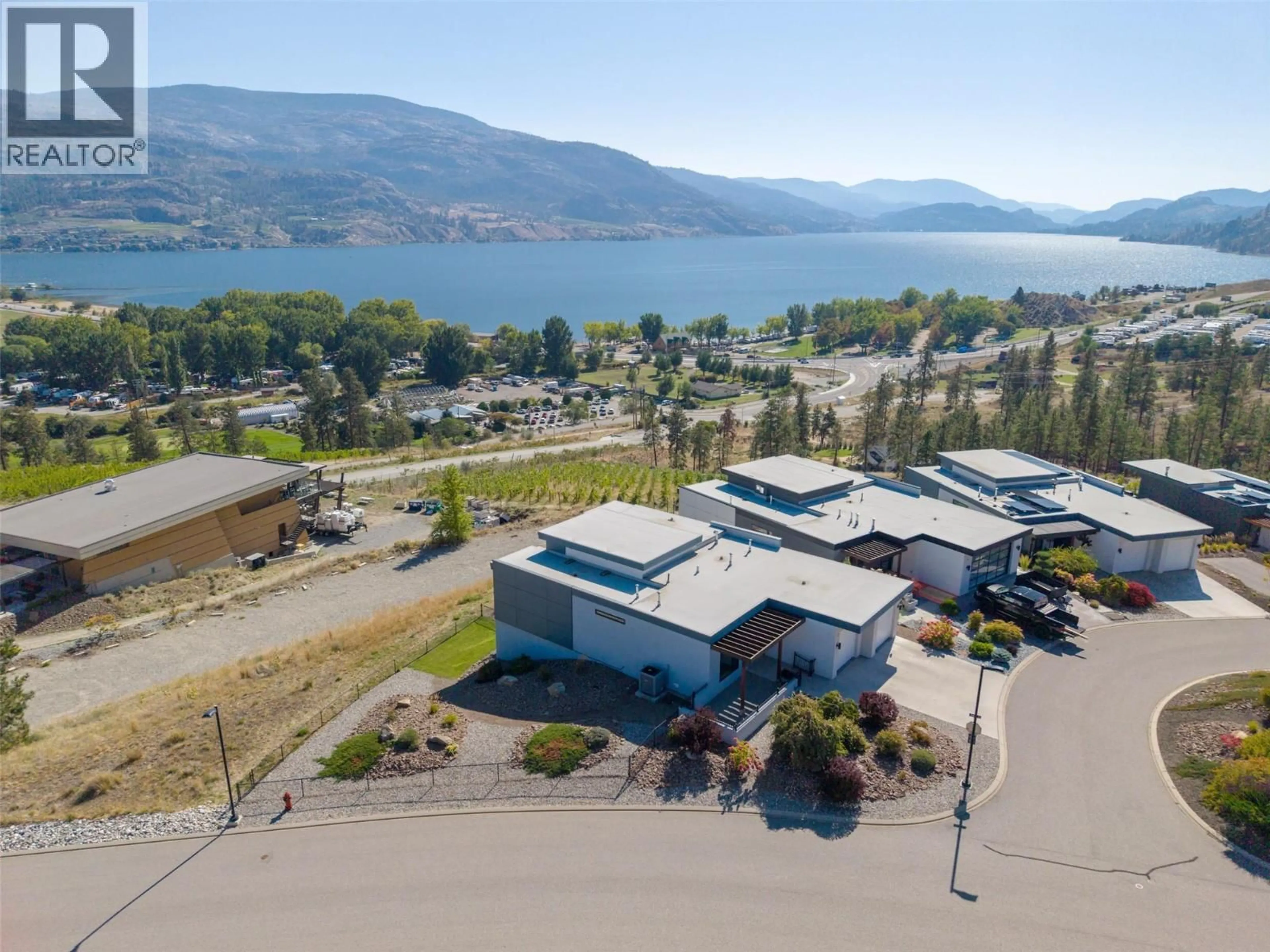 A pic from outside/outdoor area/front of a property/back of a property/a pic from drone, water/lake/river/ocean view for 104 VIEW WAY, Penticton British Columbia V2A0A6
