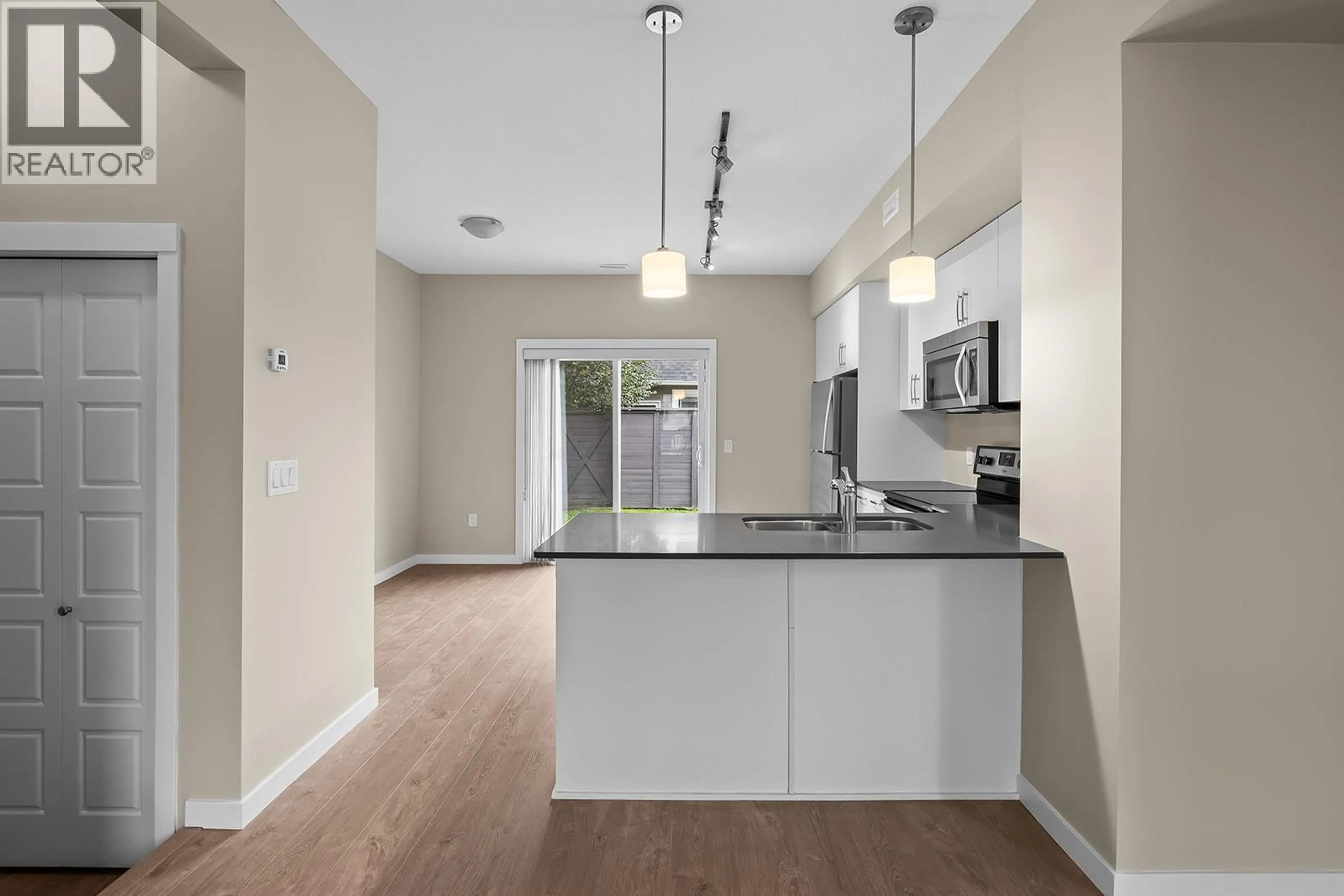 Open concept kitchen, unknown for 17 - 680 OLD MEADOWS ROAD, Kelowna British Columbia V1W5L4