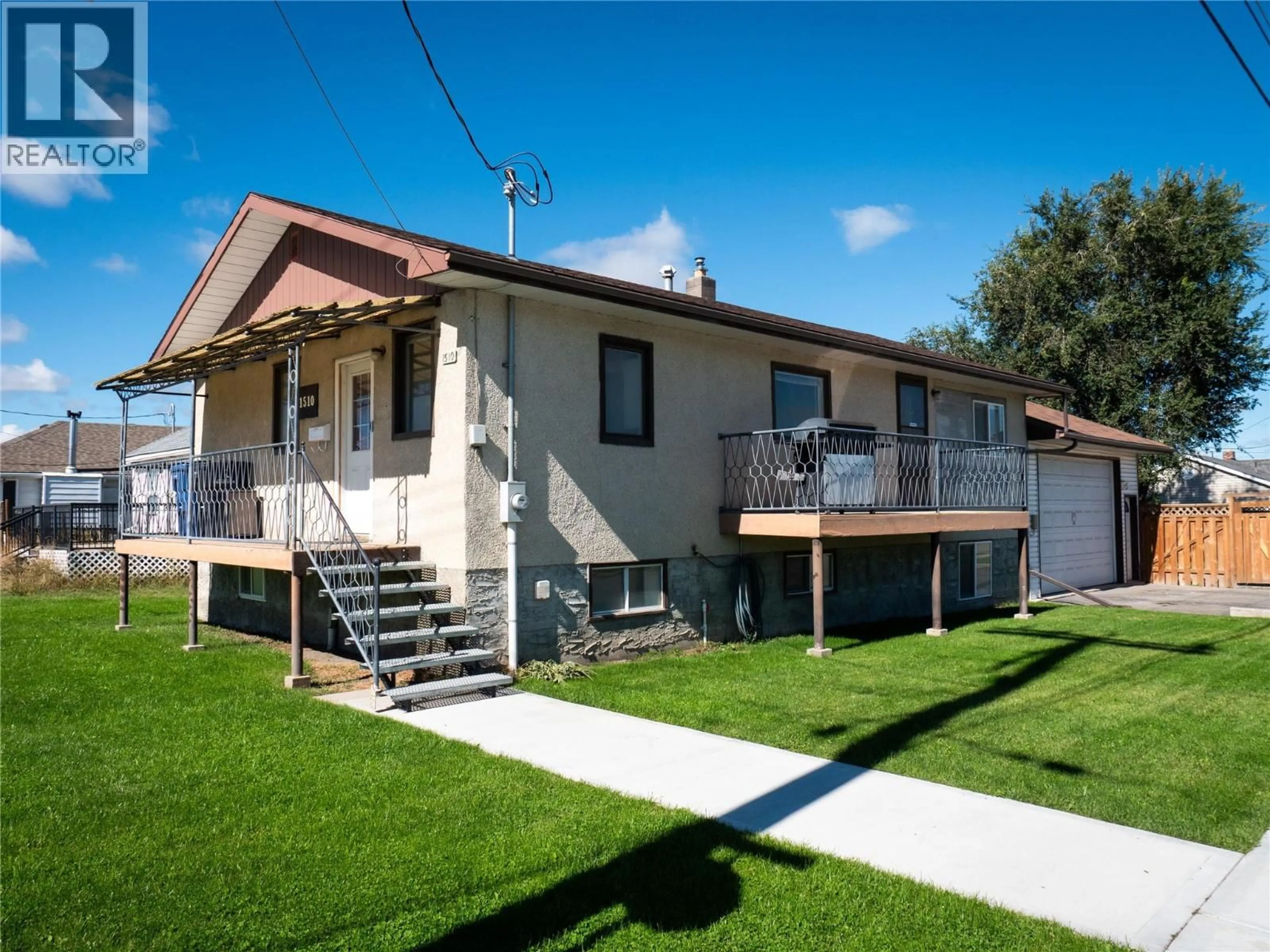 Home with vinyl exterior material, street for 1510 4TH STREET NORTH, Cranbrook British Columbia V1C3L5