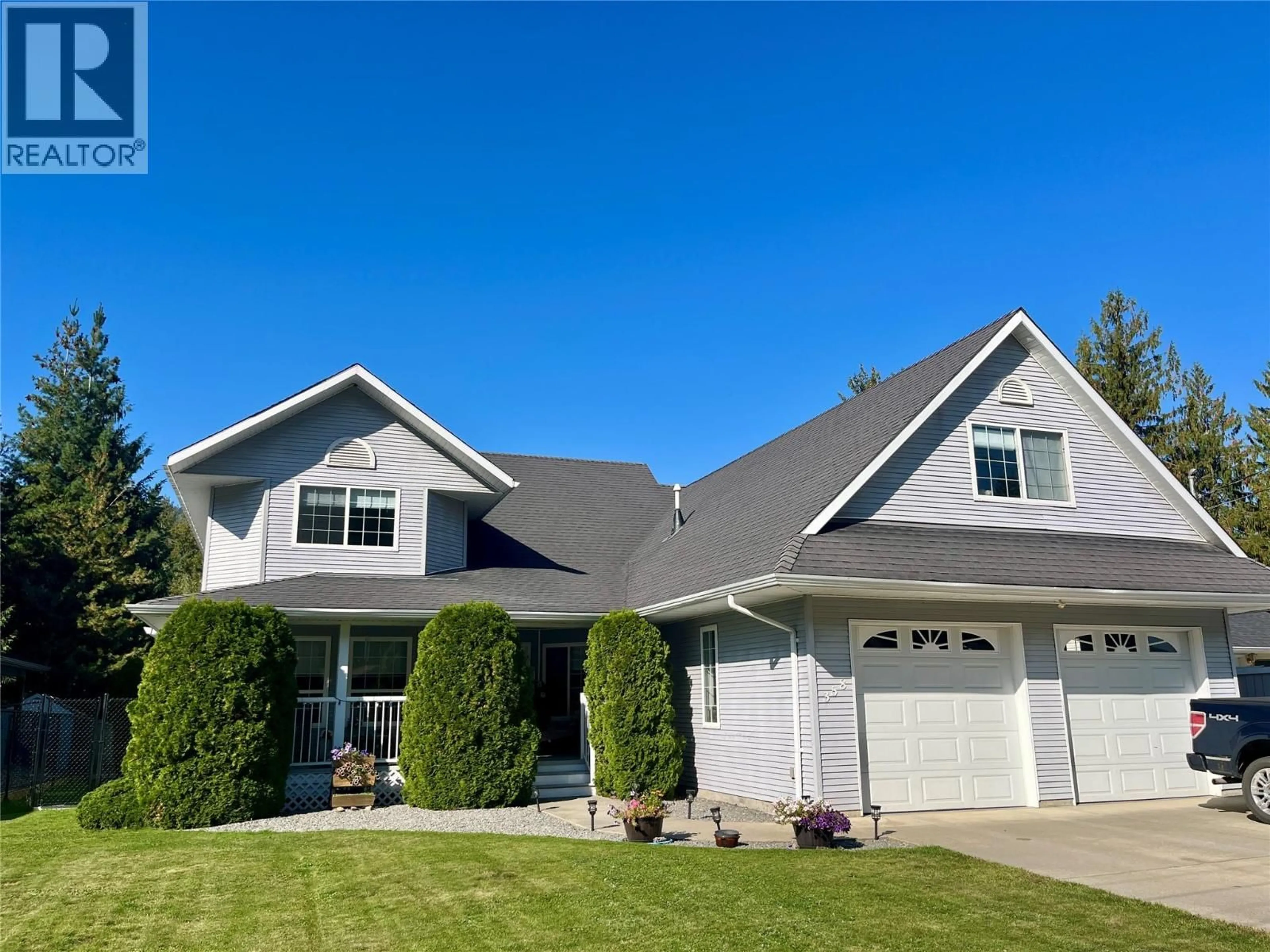 Home with vinyl exterior material, street for 358 OAK AVENUE, Sicamous British Columbia V0E2V1