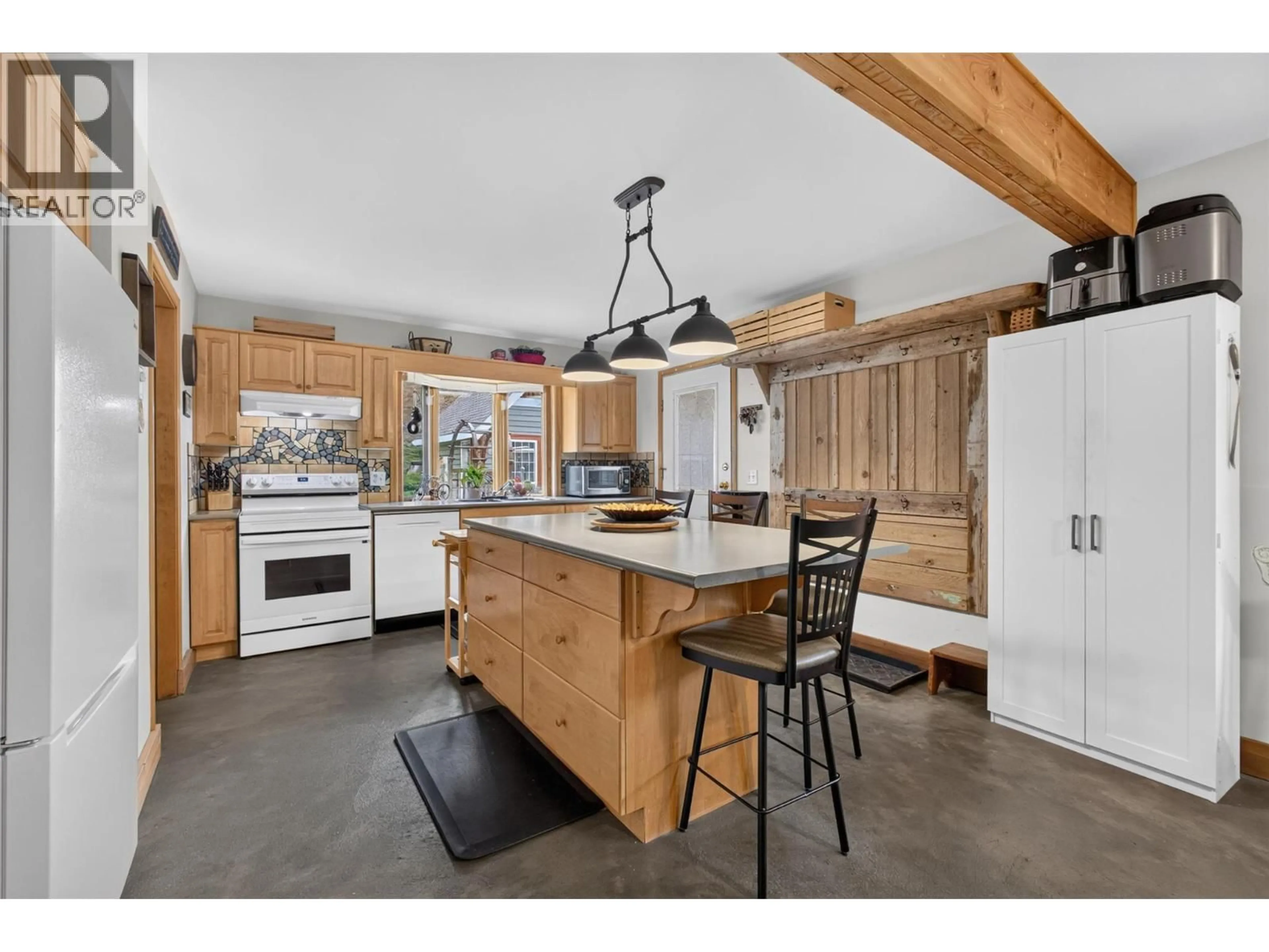 Open concept kitchen, unknown for 7366 FINTRY DELTA ROAD, Kelowna British Columbia V1Z3V2