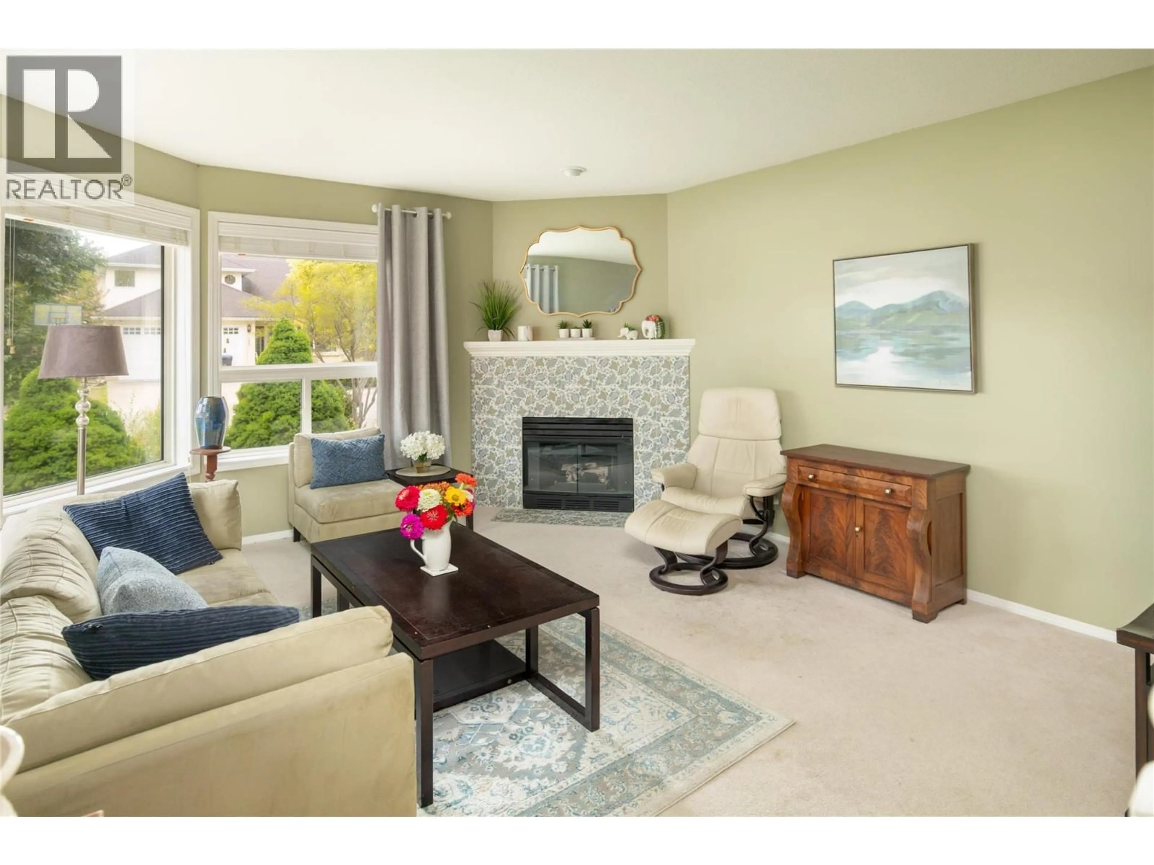Living room with furniture, unknown for 1888 PORTHILL DRIVE, Kelowna British Columbia V1V1R9