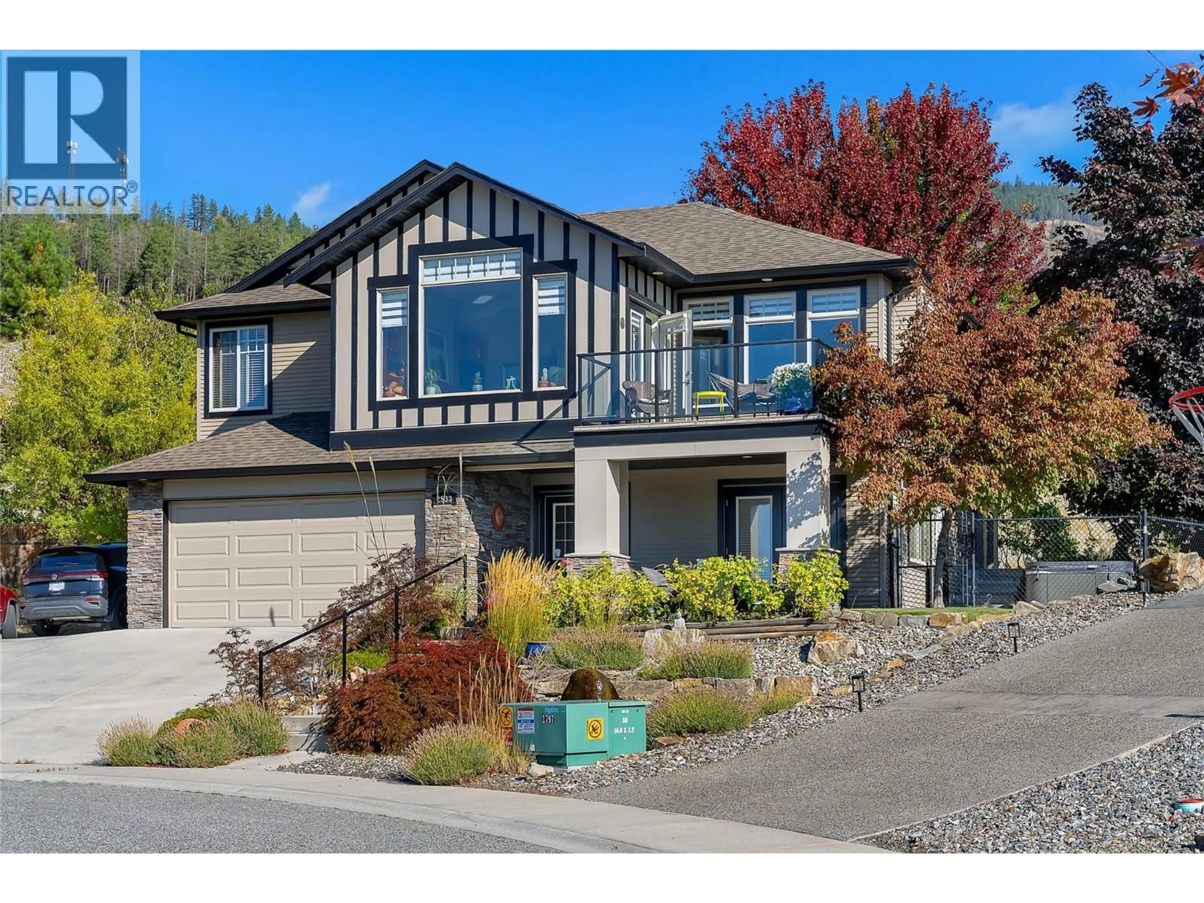 Home with vinyl exterior material, street for 2533 COPPER RIDGE DRIVE, West Kelowna British Columbia V4T2X6