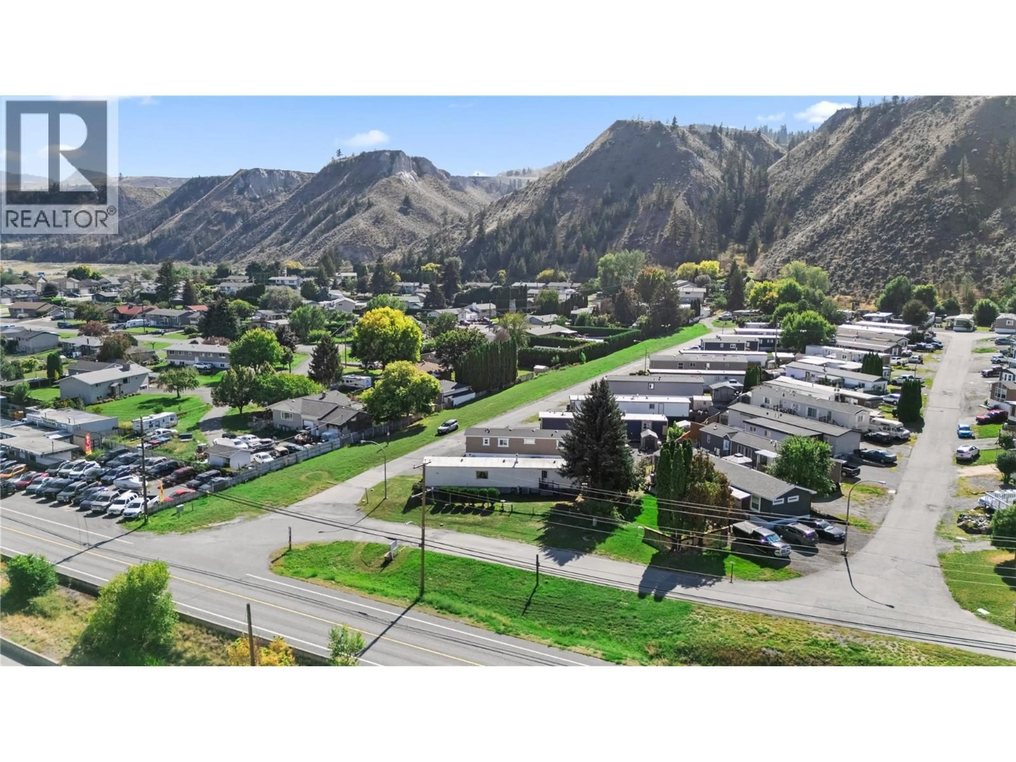 A pic from outside/outdoor area/front of a property/back of a property/a pic from drone, mountain view for A1 - 7155 DALLAS DRIVE, Kamloops British Columbia V2C4T1