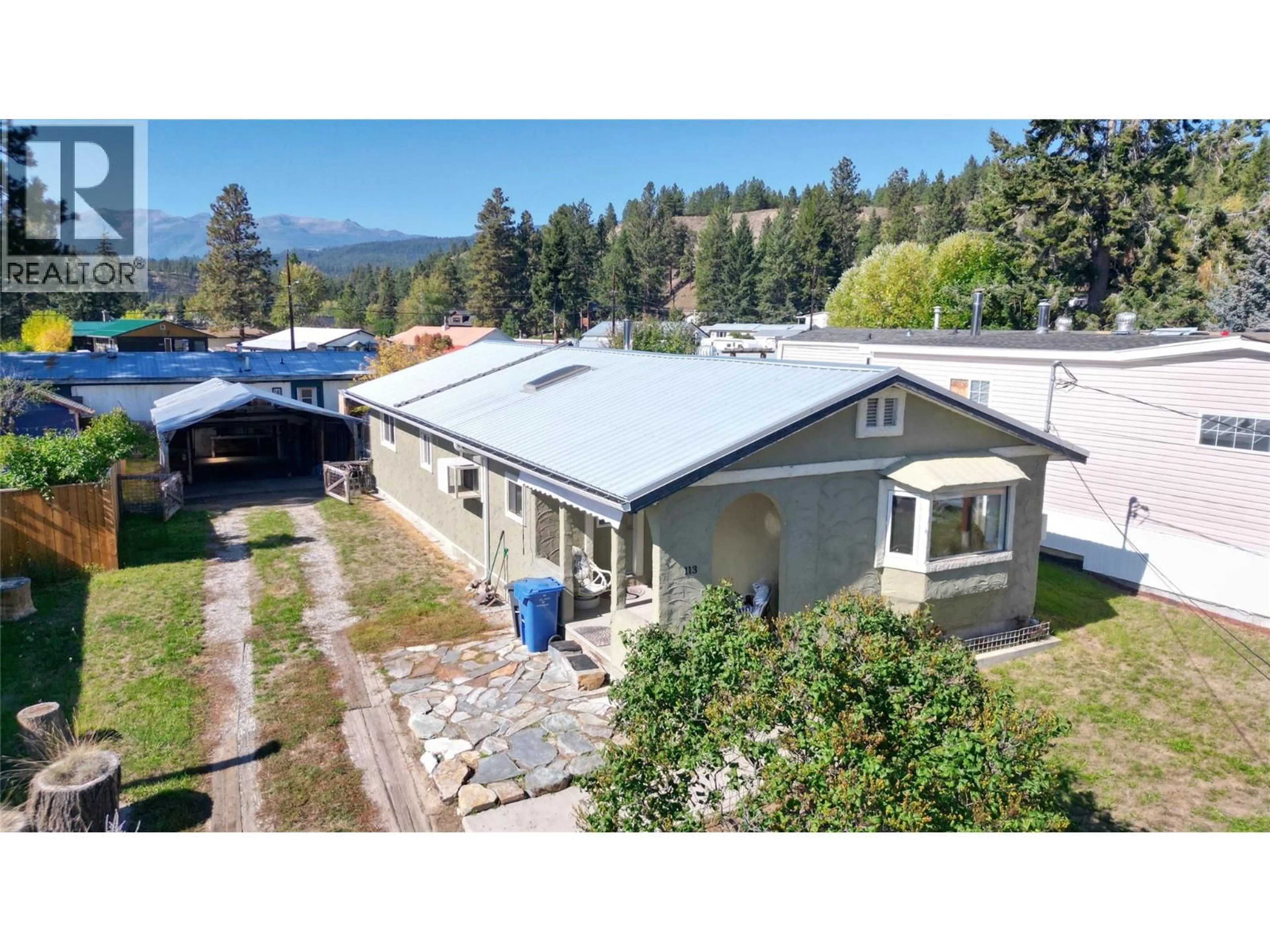 A pic from outside/outdoor area/front of a property/back of a property/a pic from drone, mountain view for 113 311 AVENUE, Kimberley British Columbia V1A3J6