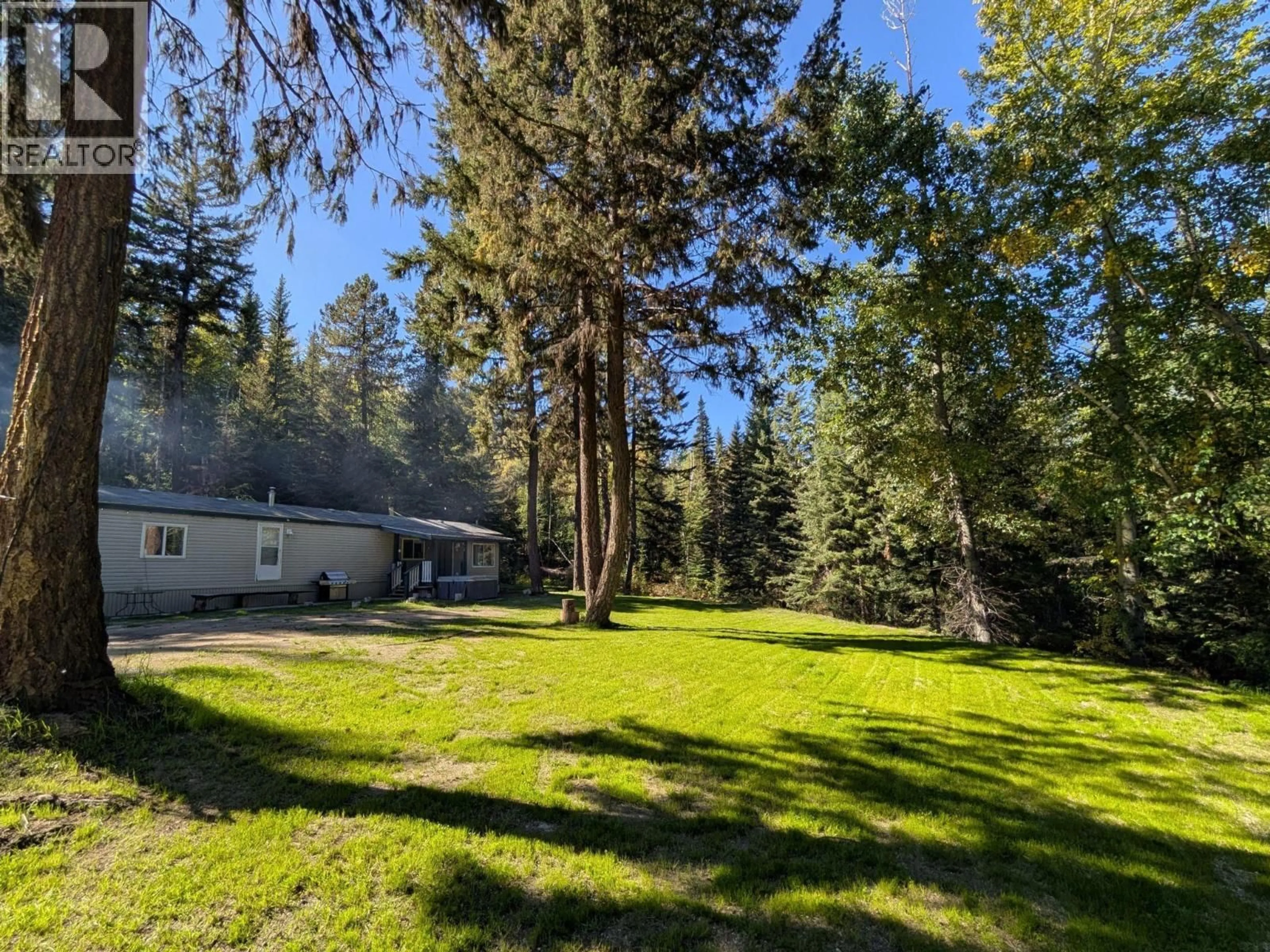 A pic from outside/outdoor area/front of a property/back of a property/a pic from drone, forest/trees view for 5745 GUN LAKE ROAD WEST, Gold Bridge British Columbia V0K1P0