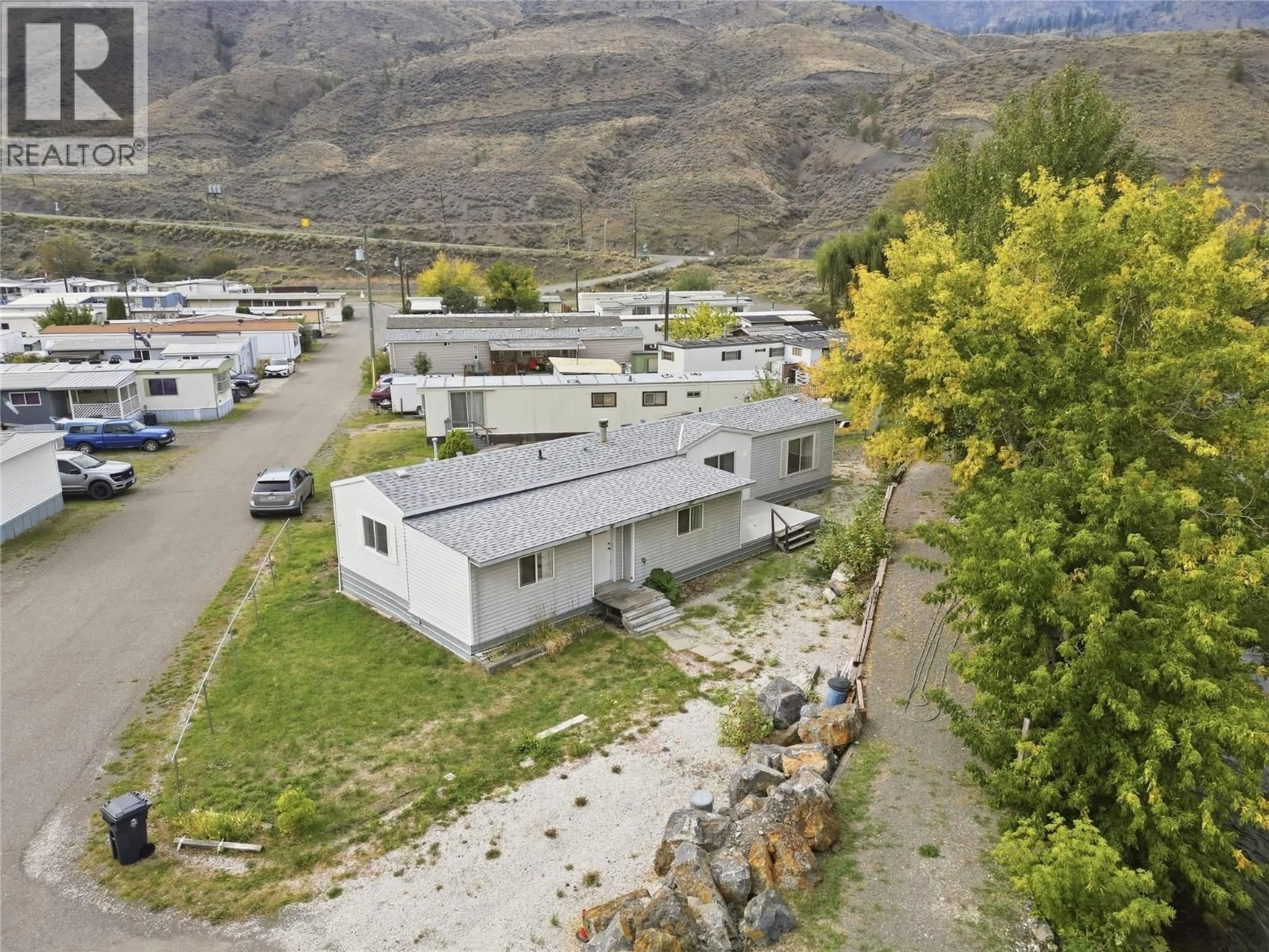 A pic from outside/outdoor area/front of a property/back of a property/a pic from drone, mountain view for 71 - 701 TRANS CANADA HIGHWAY, Cache Creek British Columbia V0K1H0