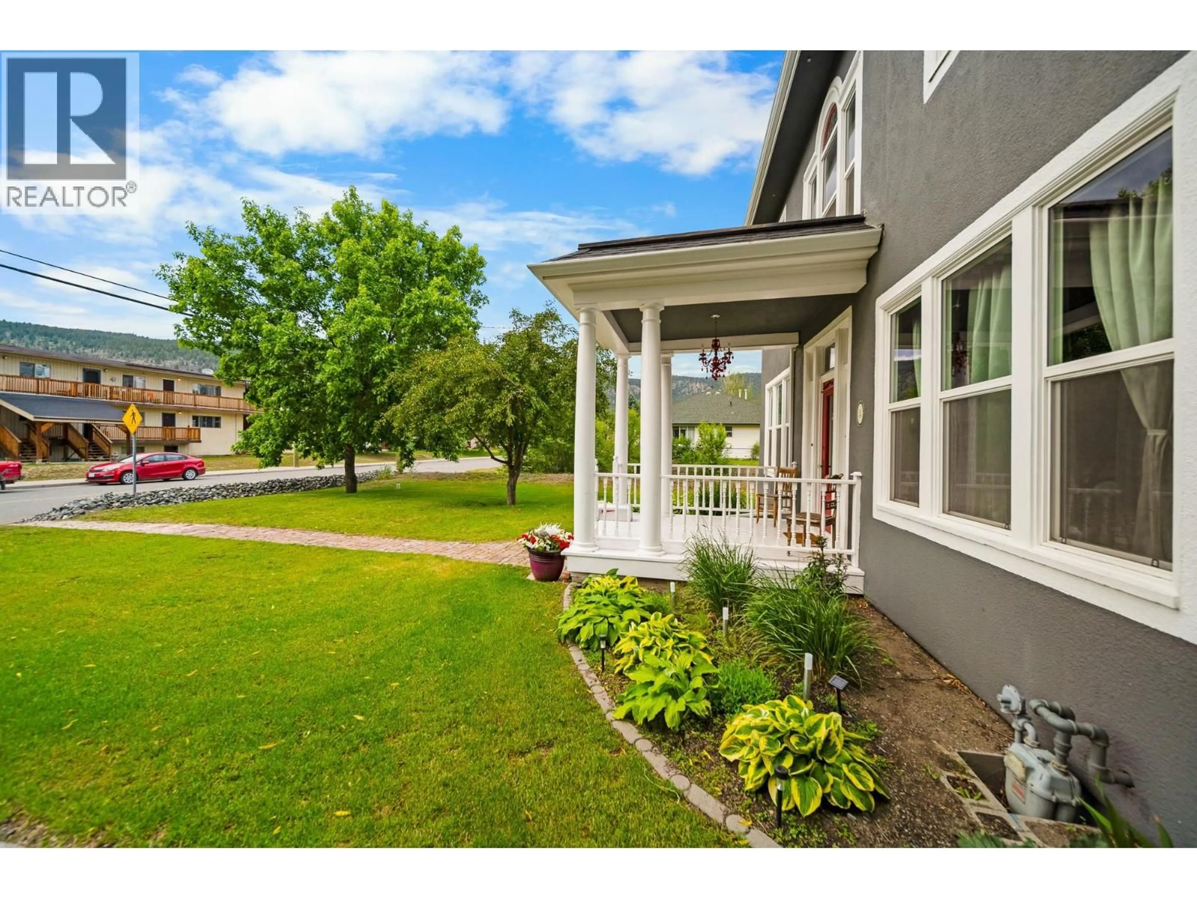 Home with vinyl exterior material, street for 2326 GARCIA STREET, Merritt British Columbia V1K1B8