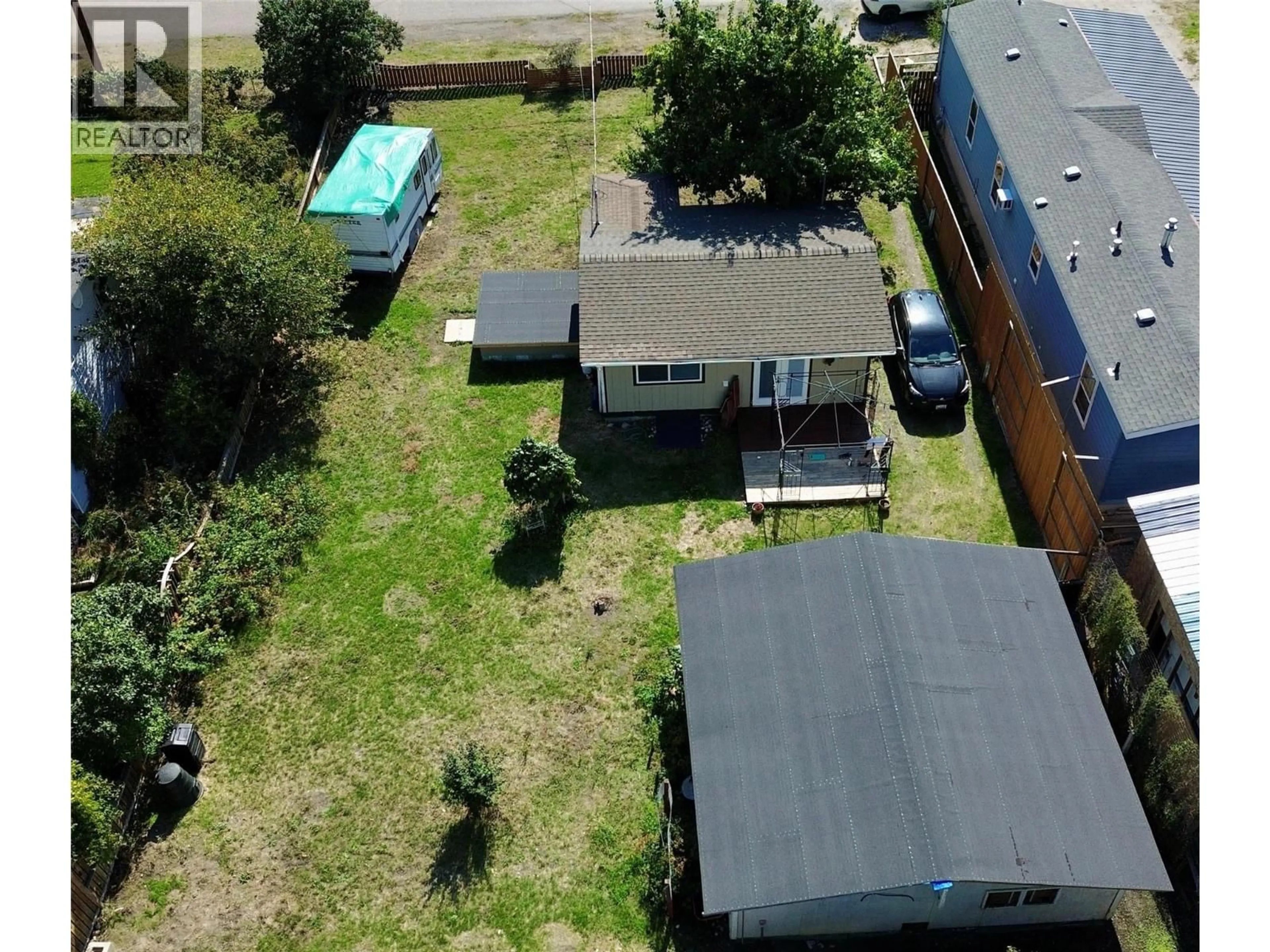 A pic from outside/outdoor area/front of a property/back of a property/a pic from drone, street for 2632 6TH STREET, Olalla British Columbia V0X1N0