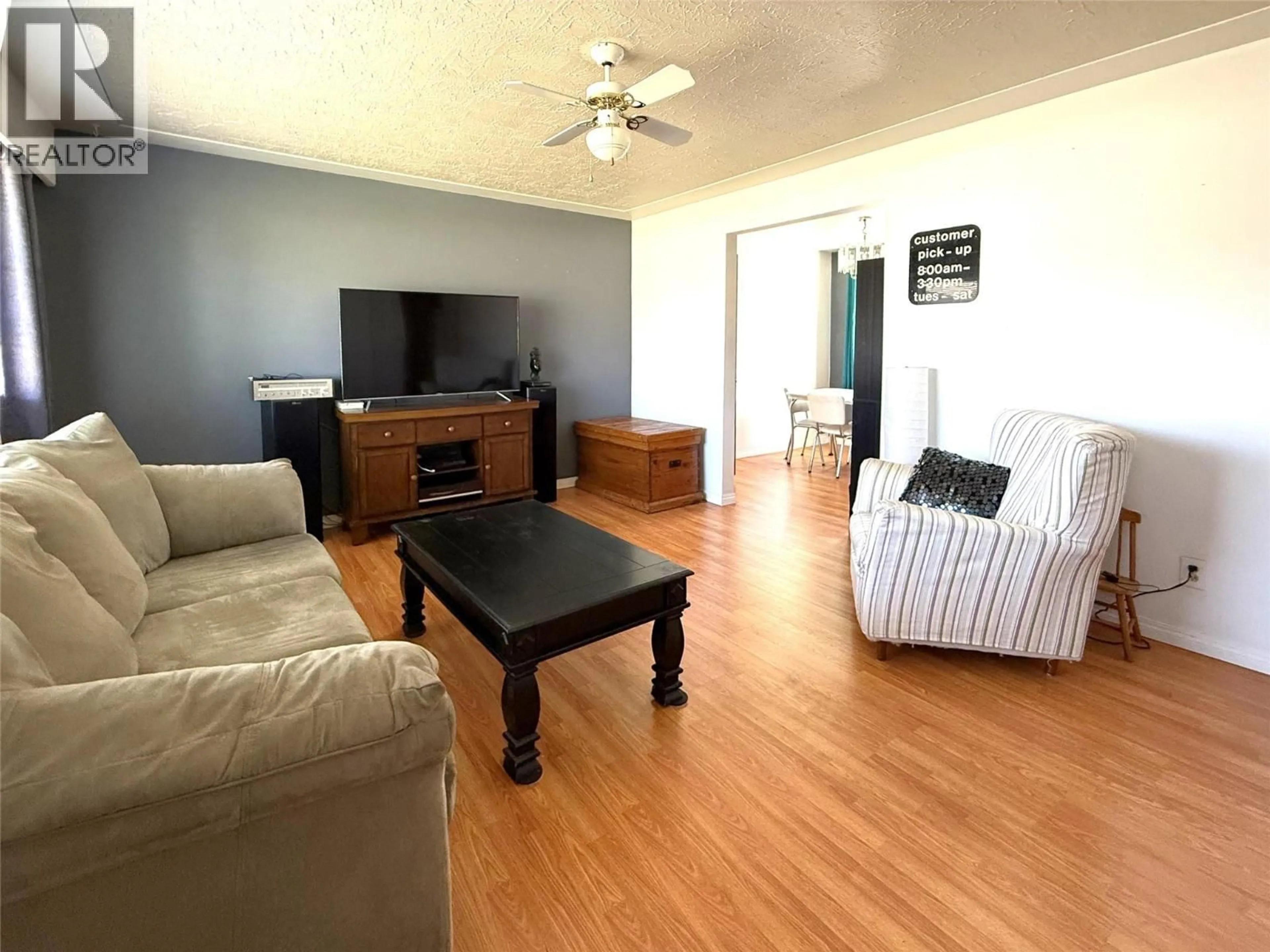 Living room with furniture, wood/laminate floor for 1359 HAMILTON STREET, Kamloops British Columbia V2B2V3