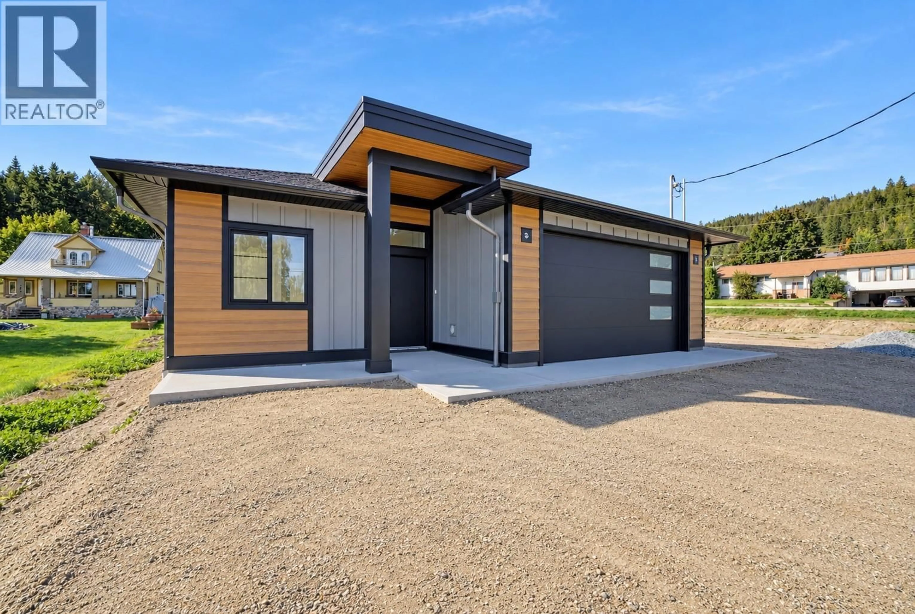 Home with vinyl exterior material, street for 186 SALMON ARM DRIVE, Enderby British Columbia V4Y4C6