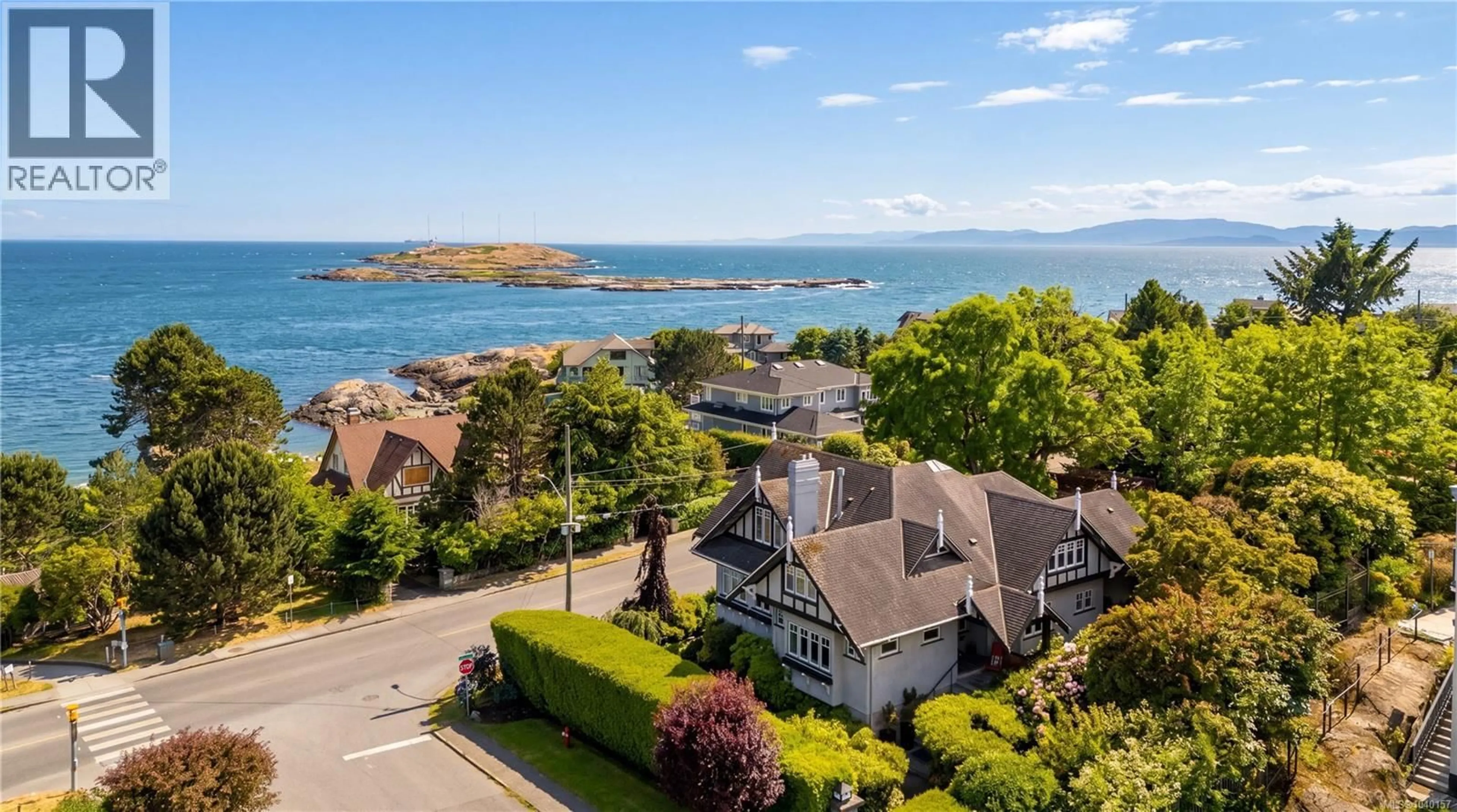 A pic from outside/outdoor area/front of a property/back of a property/a pic from drone, water/lake/river/ocean view for 318 NEWPORT AVENUE, Oak Bay British Columbia V8S5C5